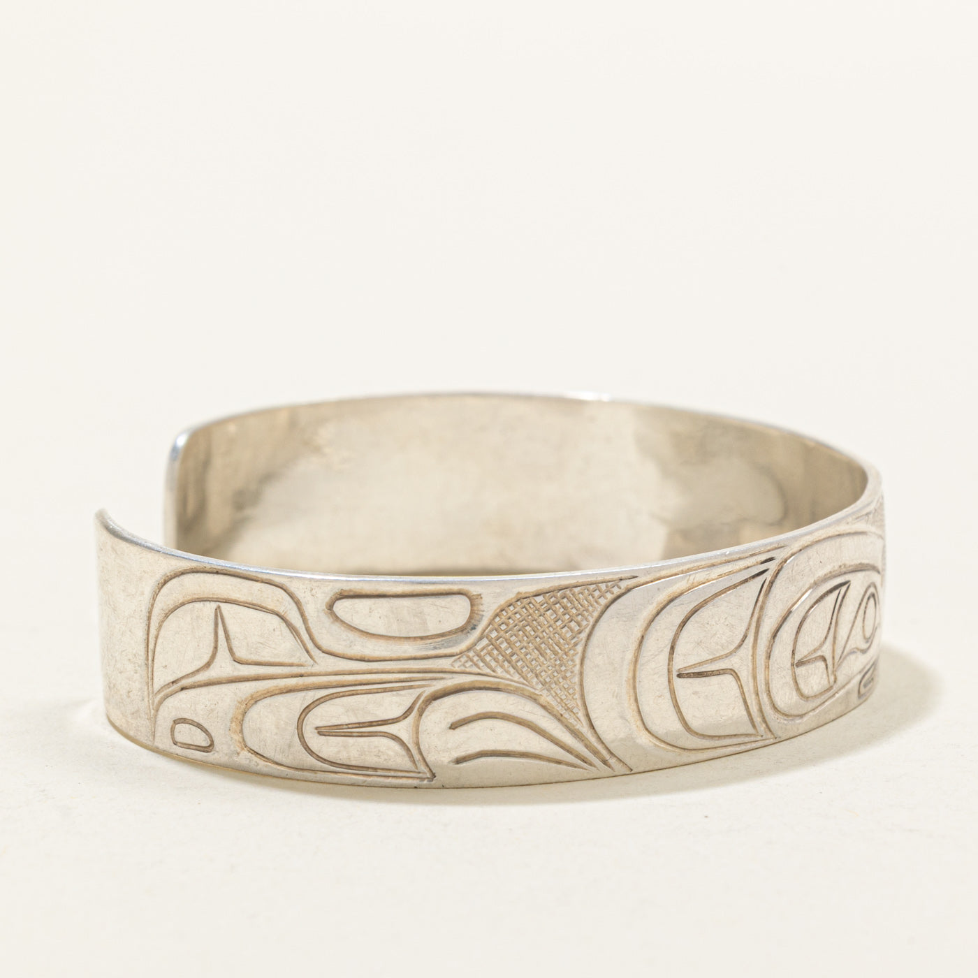 'Travis Henry' Sterling Silver Indigenous Carved Orca & Bird Cuff | 6"