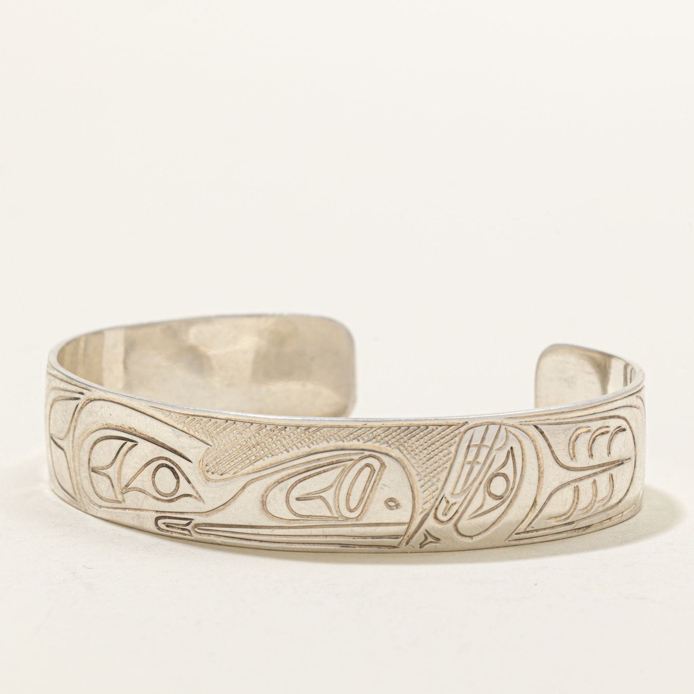 'Travis Henry' Sterling Silver Indigenous Carved Orca & Bird Cuff | 6"