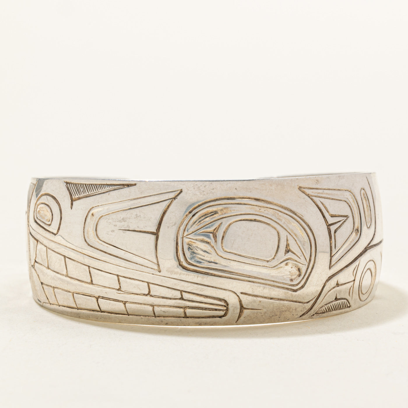 Sterling Silver Indigenous Carved Wolf Cuff | 6.5"