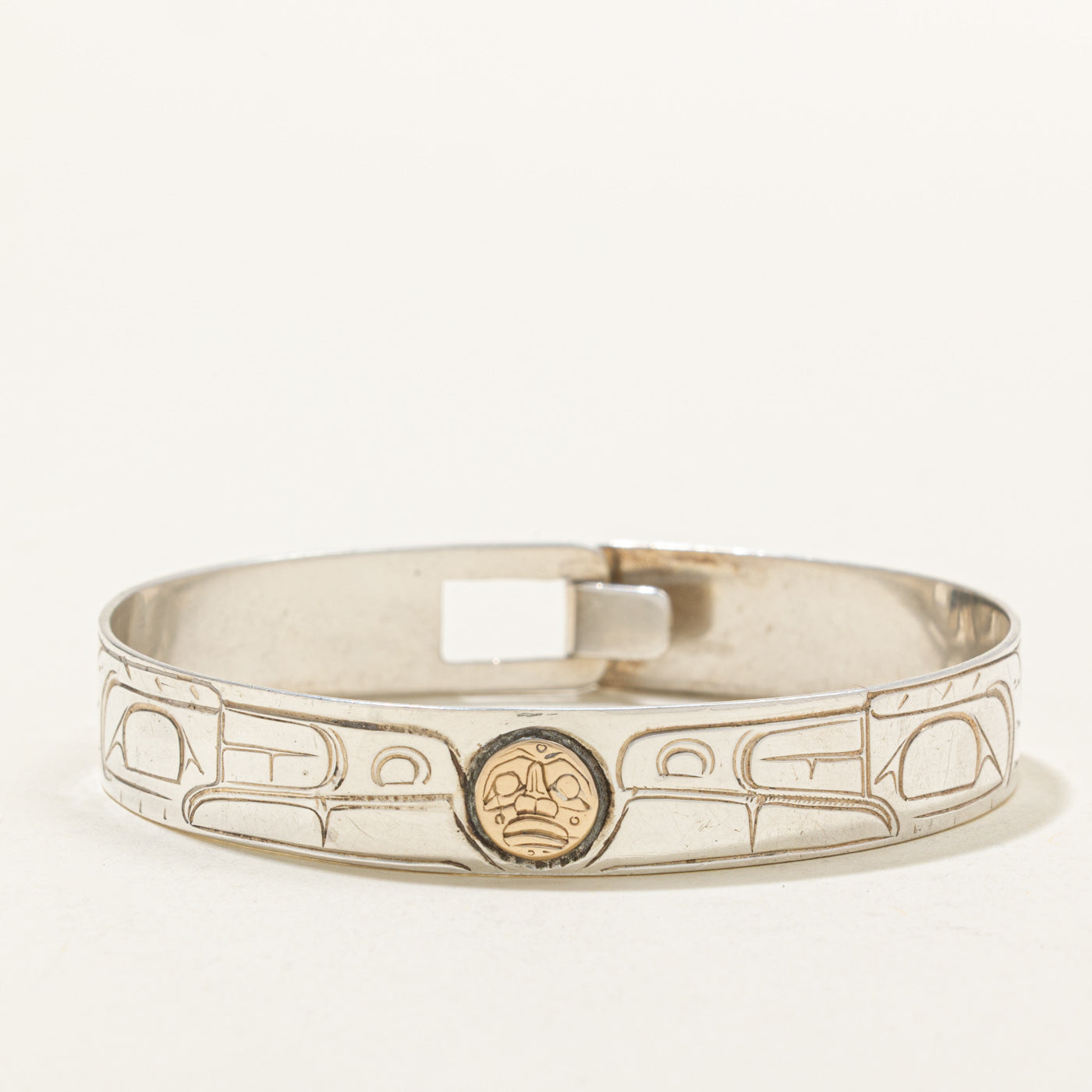 Sterling Silver & 14K Indigenous Carved Wolves & Moon Bangle | 7"