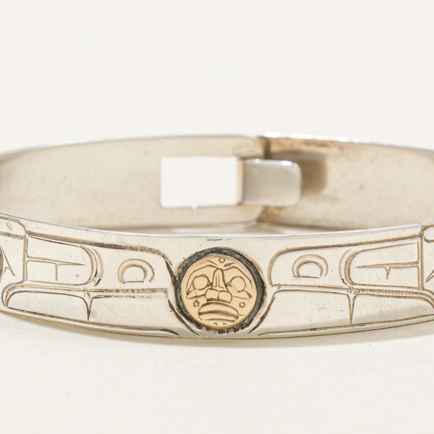 Sterling Silver & 14K Indigenous Carved Wolves & Moon Bangle | 7"