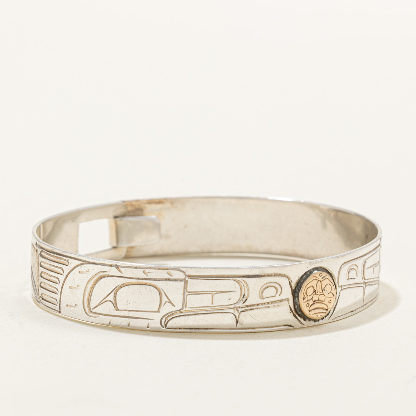 Sterling Silver & 14K Indigenous Carved Wolves & Moon Bangle | 7"
