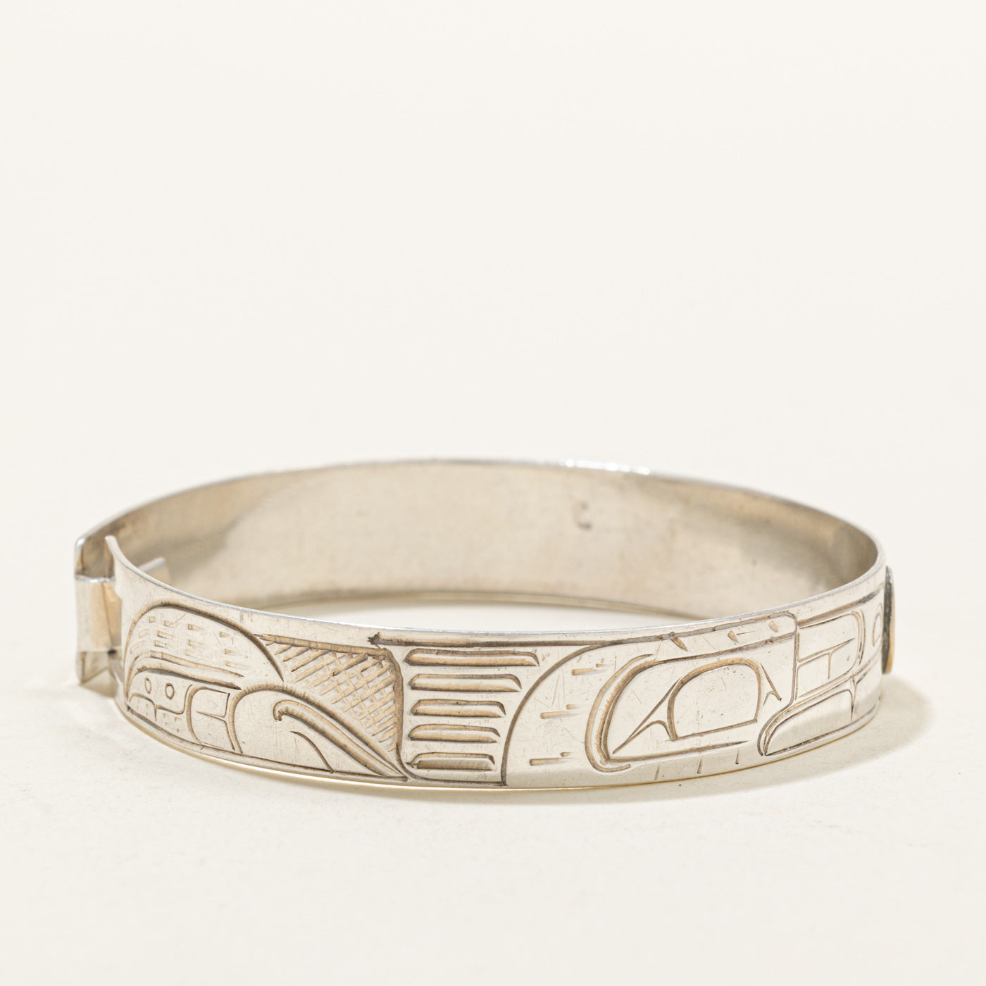 Sterling Silver & 14K Indigenous Carved Wolves & Moon Bangle | 7"