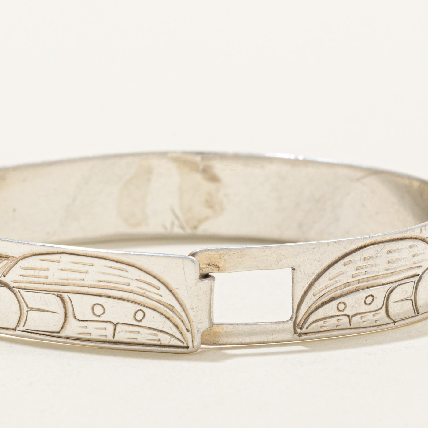 Sterling Silver & 14K Indigenous Carved Wolves & Moon Bangle | 7"