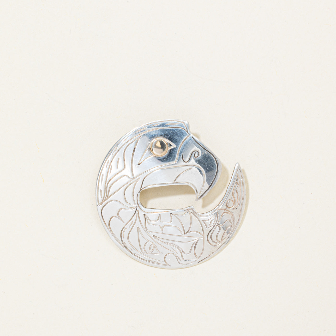 Sterling Silver & 14K Gold Indigenous Carved Eagle Pendant