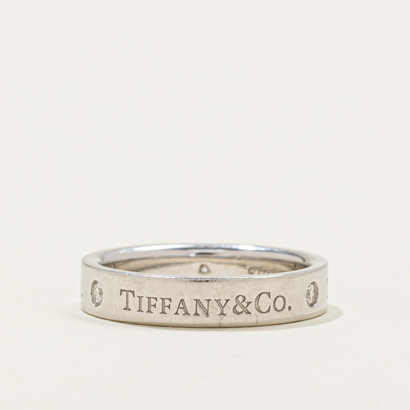 ‘Tiffany & Co’ T&Co. Band Ring | 0.07ctw | 4mm | SZ 7