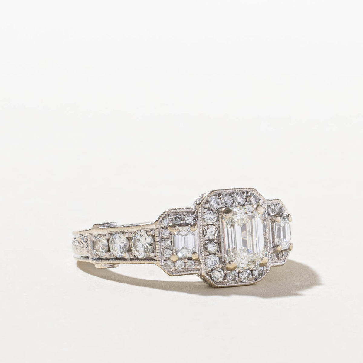 14k Three Stone Emerald Cut Diamond Halo Ring | 0.82ct SI2 G/H, 1.28ctw | SZ 7