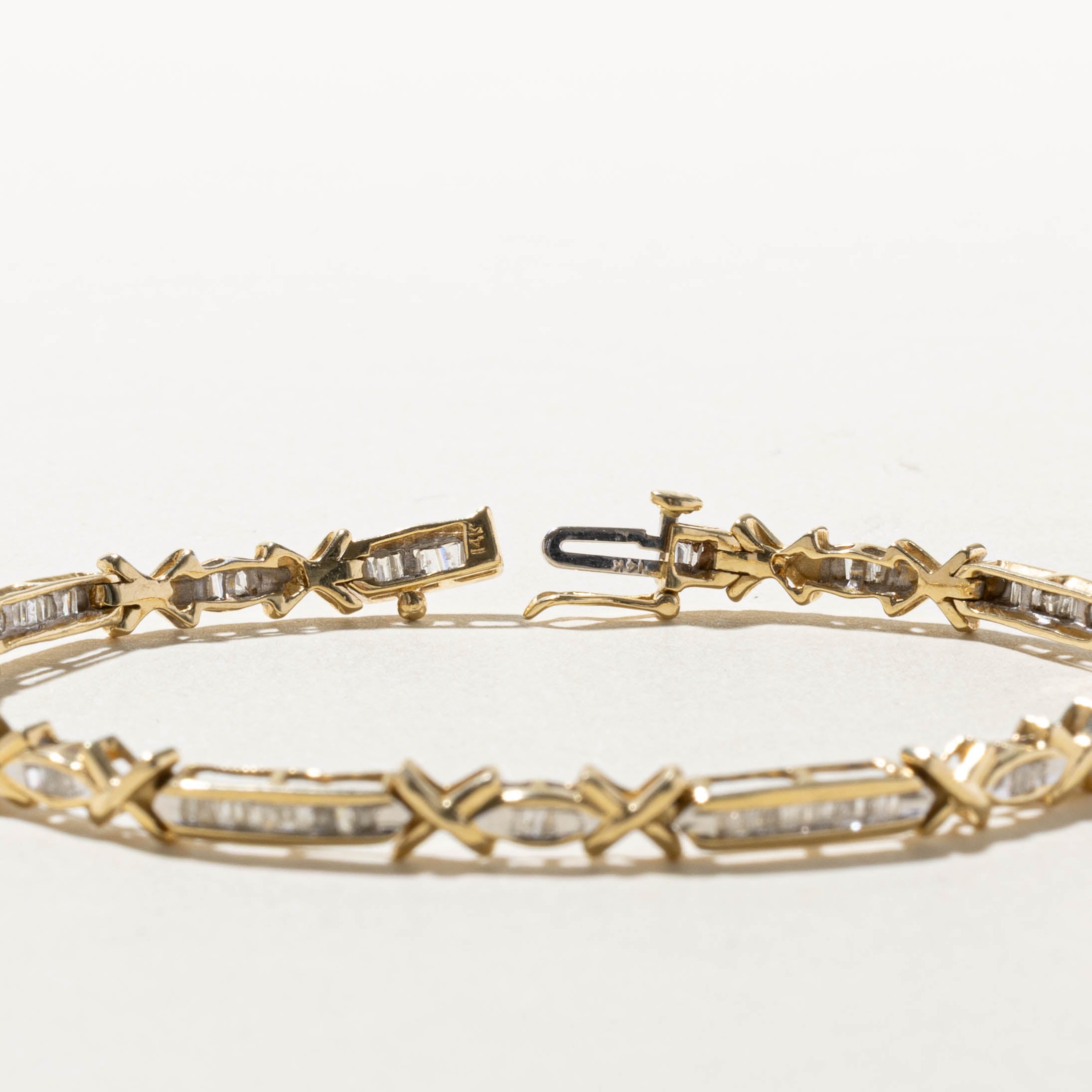 14k Channel Set Diamond “X" Tennis Bracelet | 0.49ctw | 7.5"