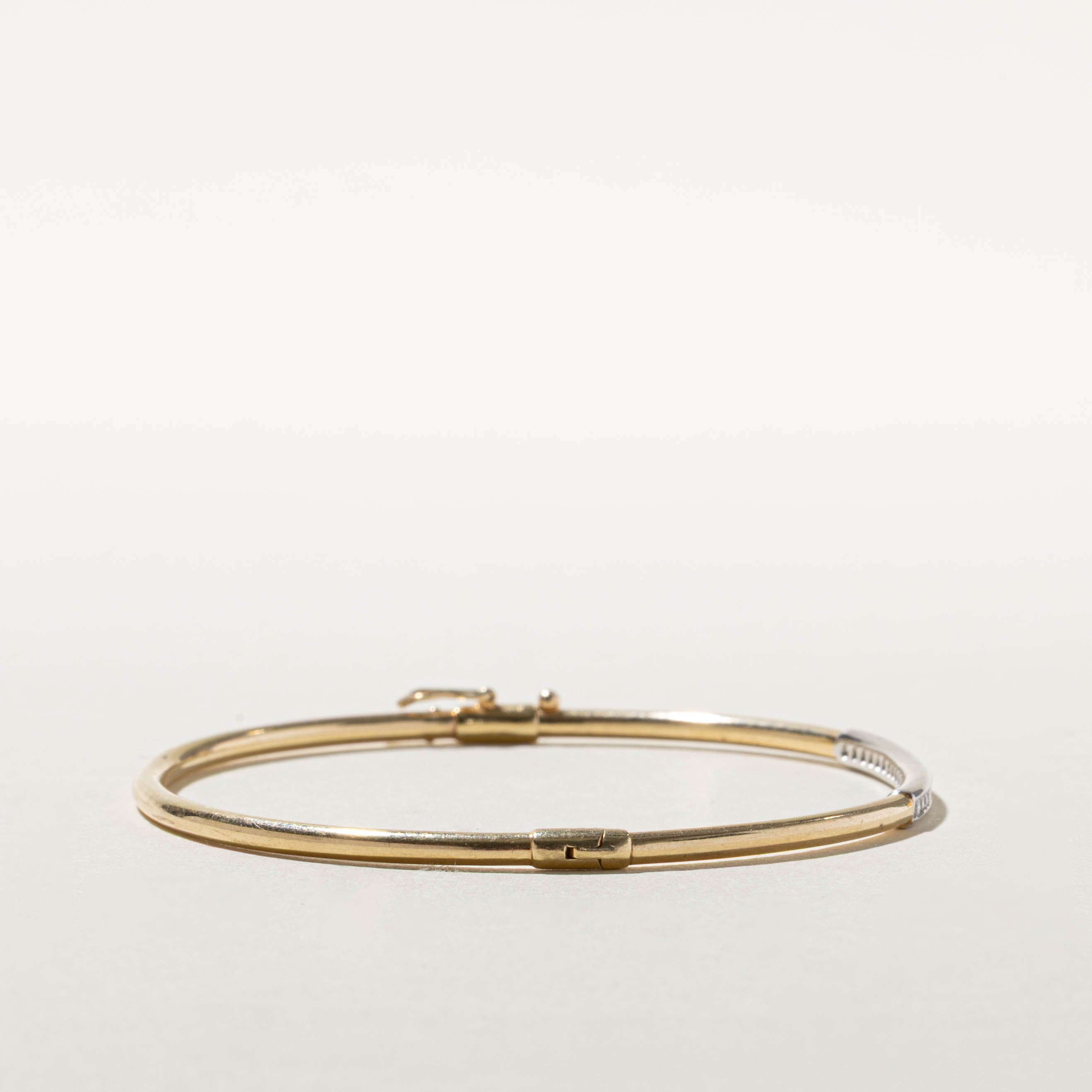 10k Two Tone Channel Set Diamond Bangle | 0.18ctw | 7.5"
