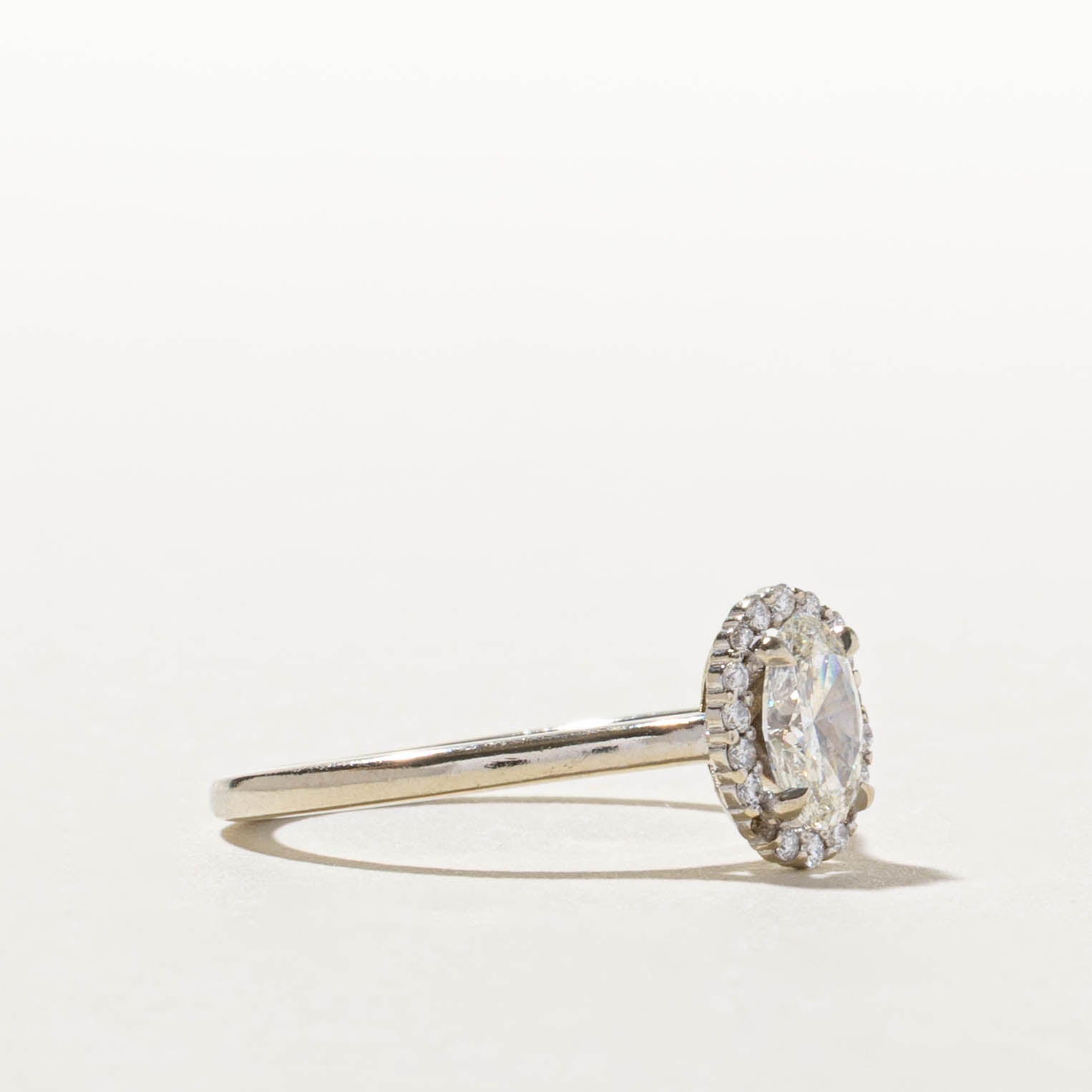 14k GIA Oval Cut Diamond Halo Ring | GIA 0.70ct SI1 H, 0.14ctw | SZ 8