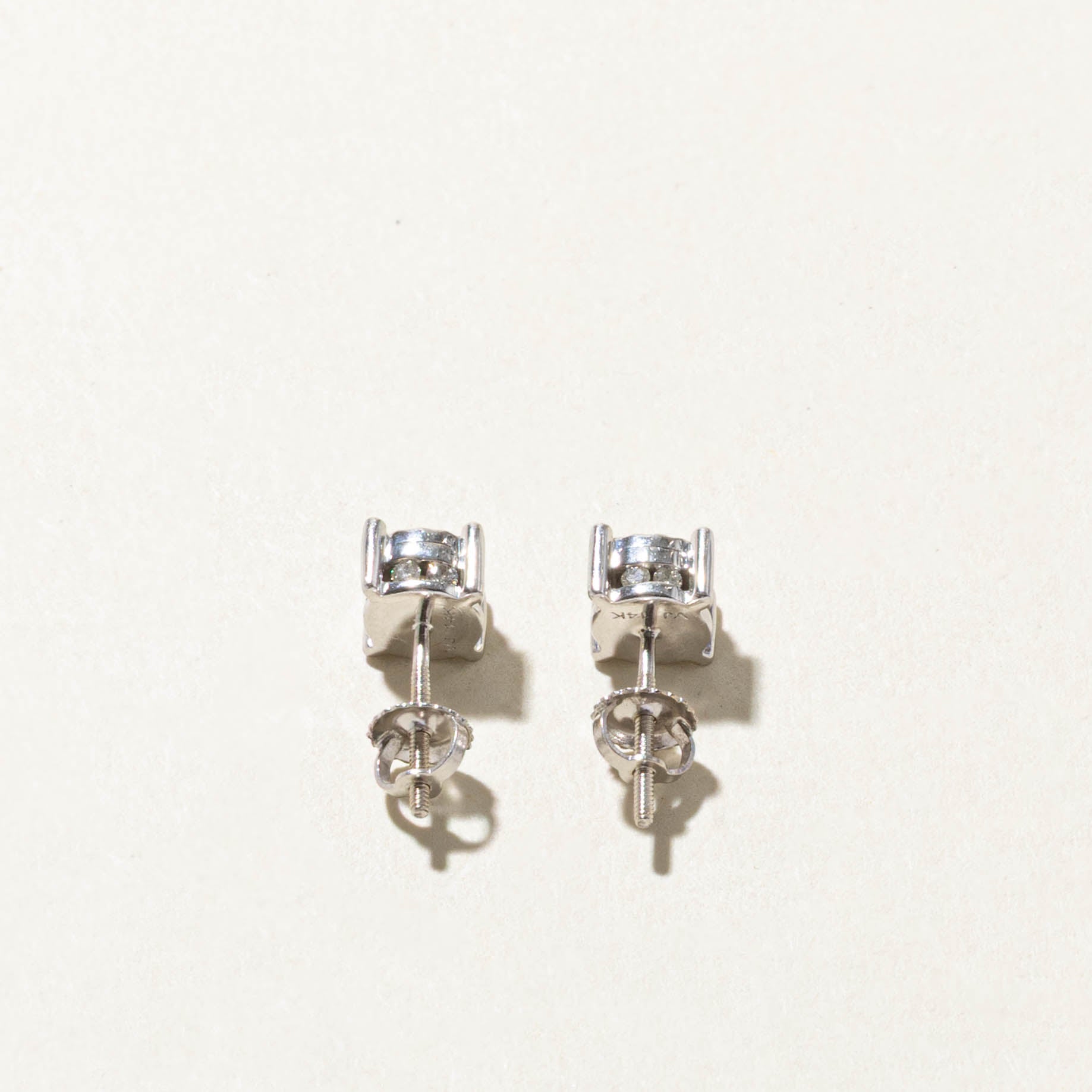 14k Illusion Set & Hidden Diamond Stud Earrings | 0.60ctw