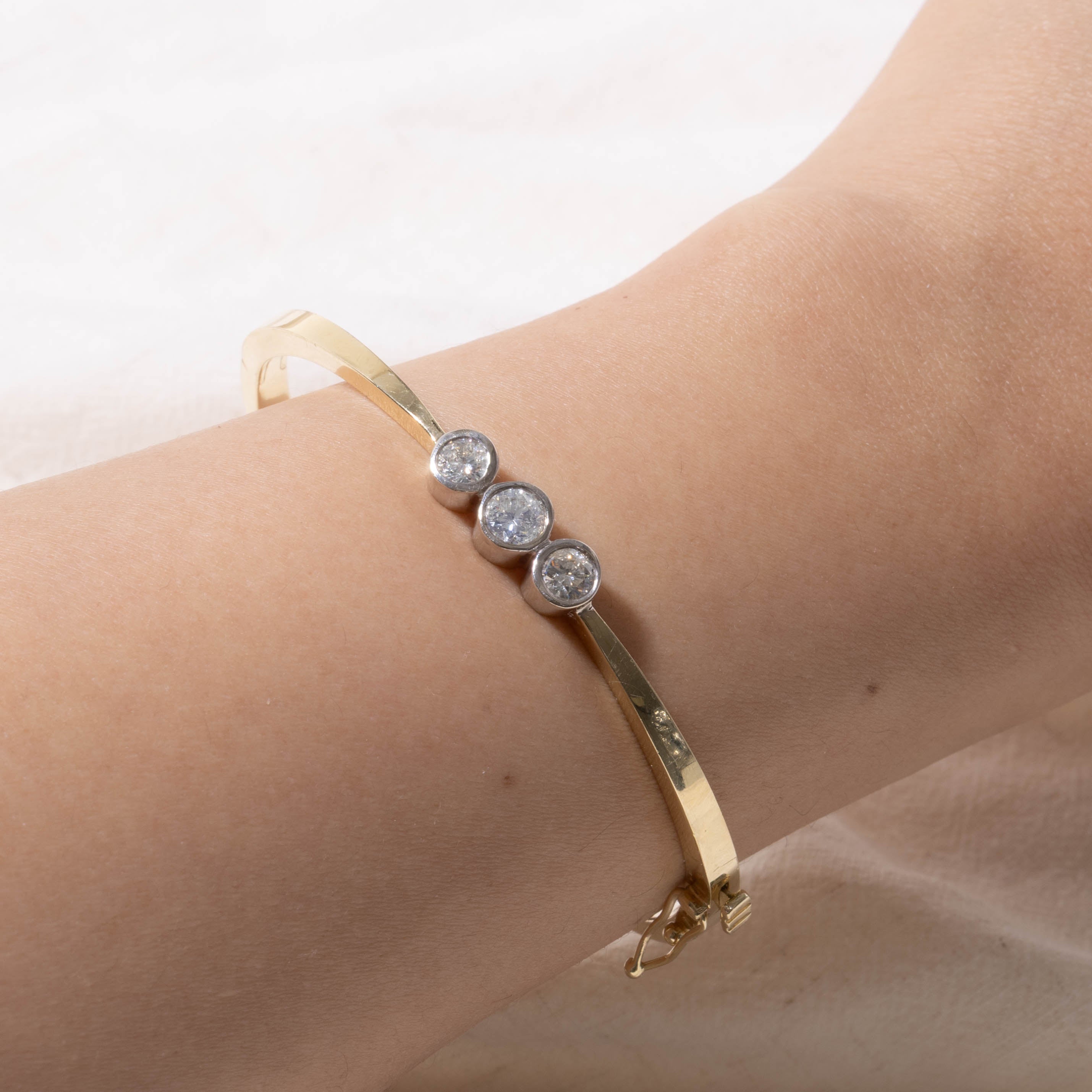 14k Bezel Set Three Stone Diamond Bangle Bracelet | 0.66ctw