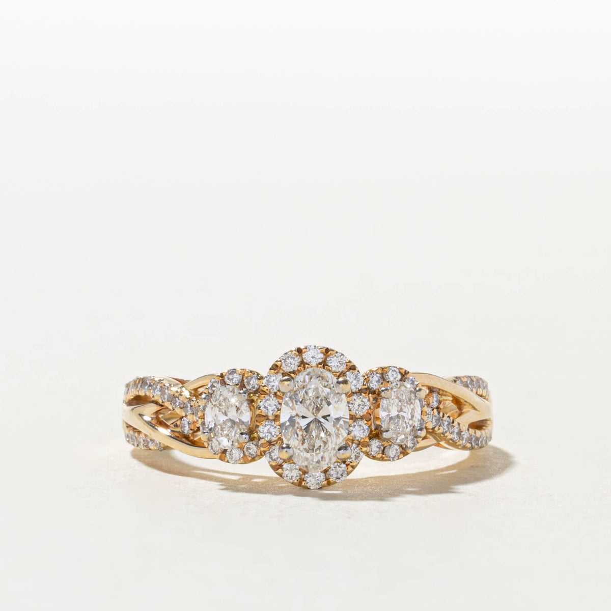 14k Three Stone Diamond Halo Cross Over Ring | 1.06ctw, 0.04ctw | SZ 9.25