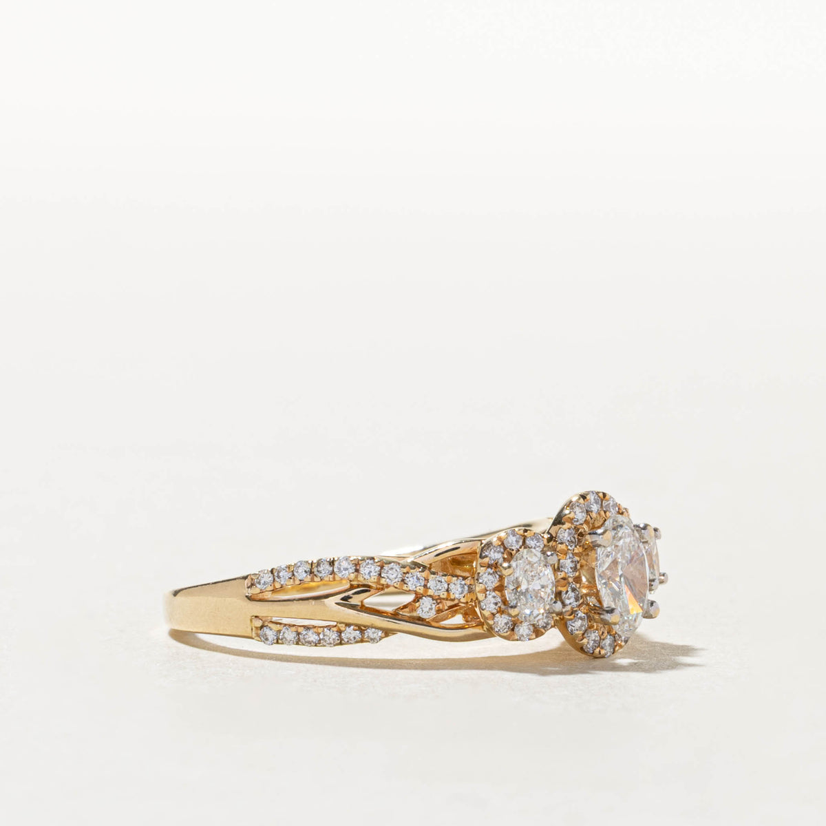 14k Three Stone Diamond Halo Cross Over Ring | 1.06ctw, 0.04ctw | SZ 9.25