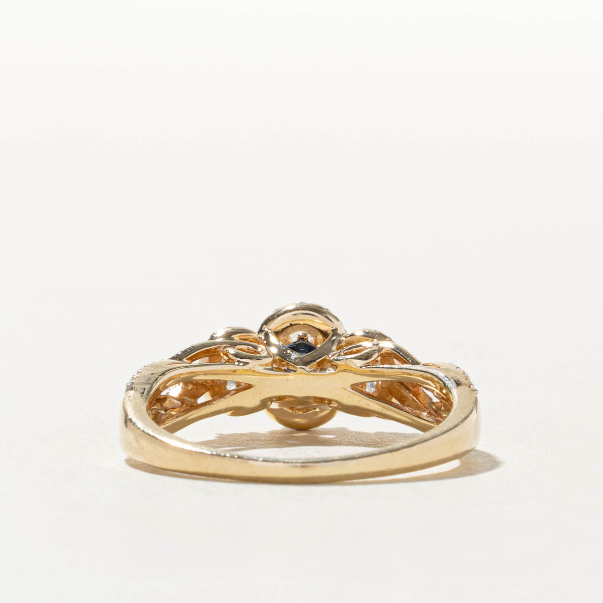 14k Three Stone Diamond Halo Cross Over Ring | 1.06ctw, 0.04ctw | SZ 9.25
