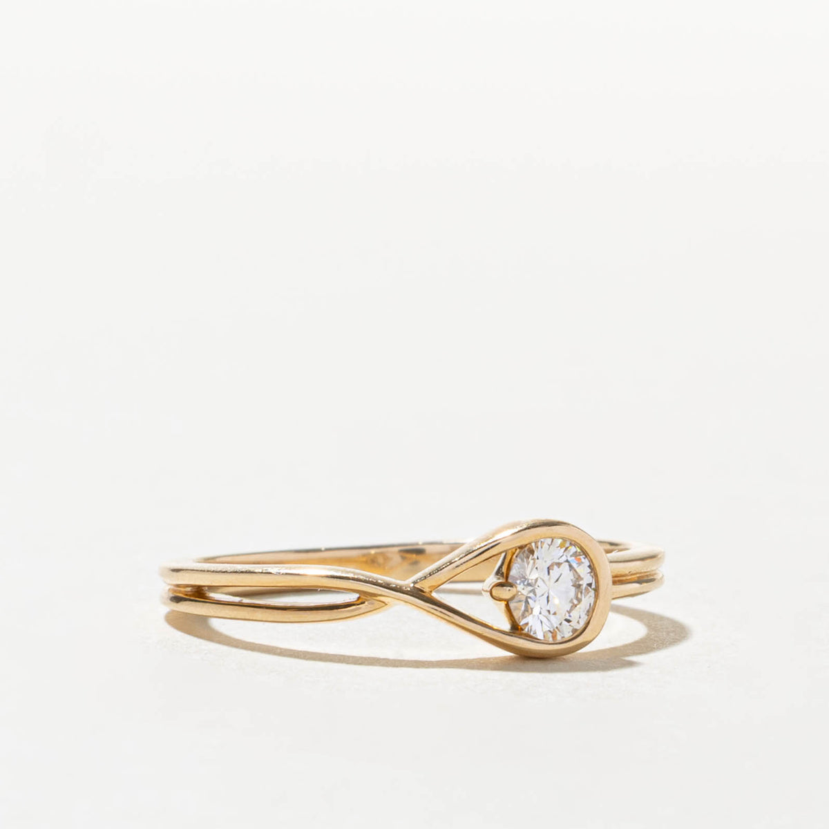 14k Solitaire Diamond Looped Cross Over Ring | 0.25ct VS1 H | SZ 7.75