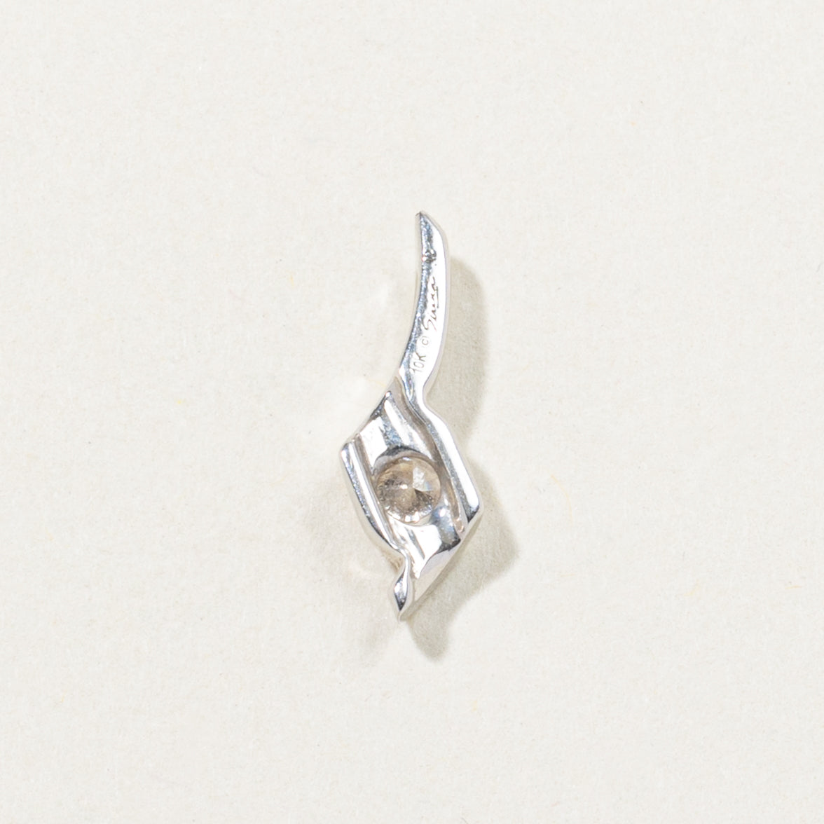 10k Tension Set Diamond Pendant | 0.12ct