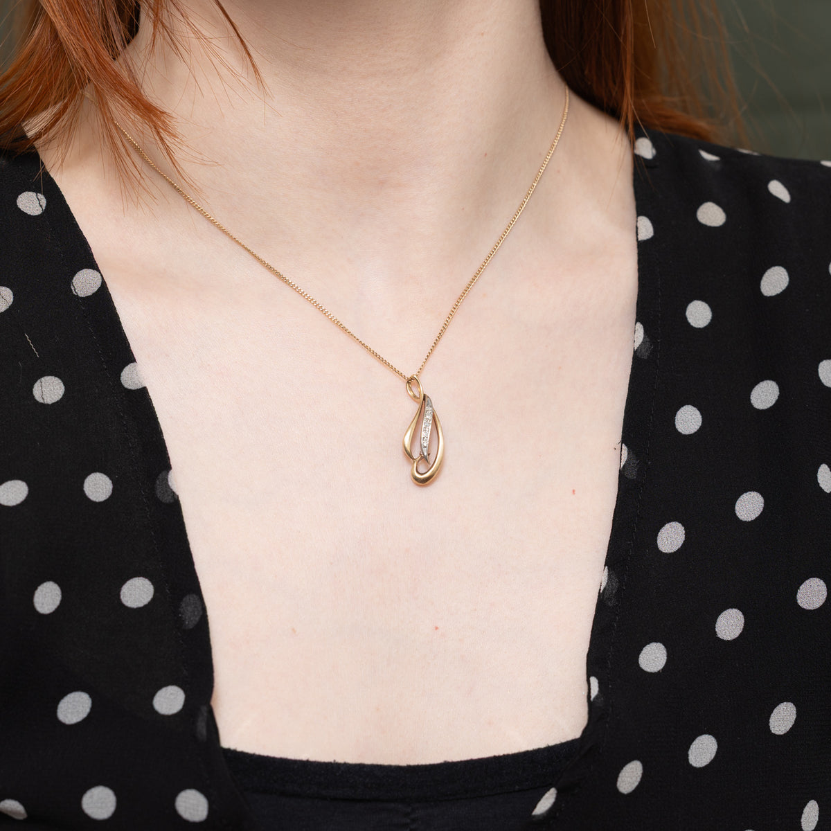10k Diamond Abstract Looped Pendant