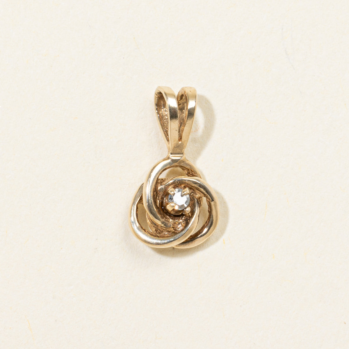 10k Single Diamond Swirl Pendant