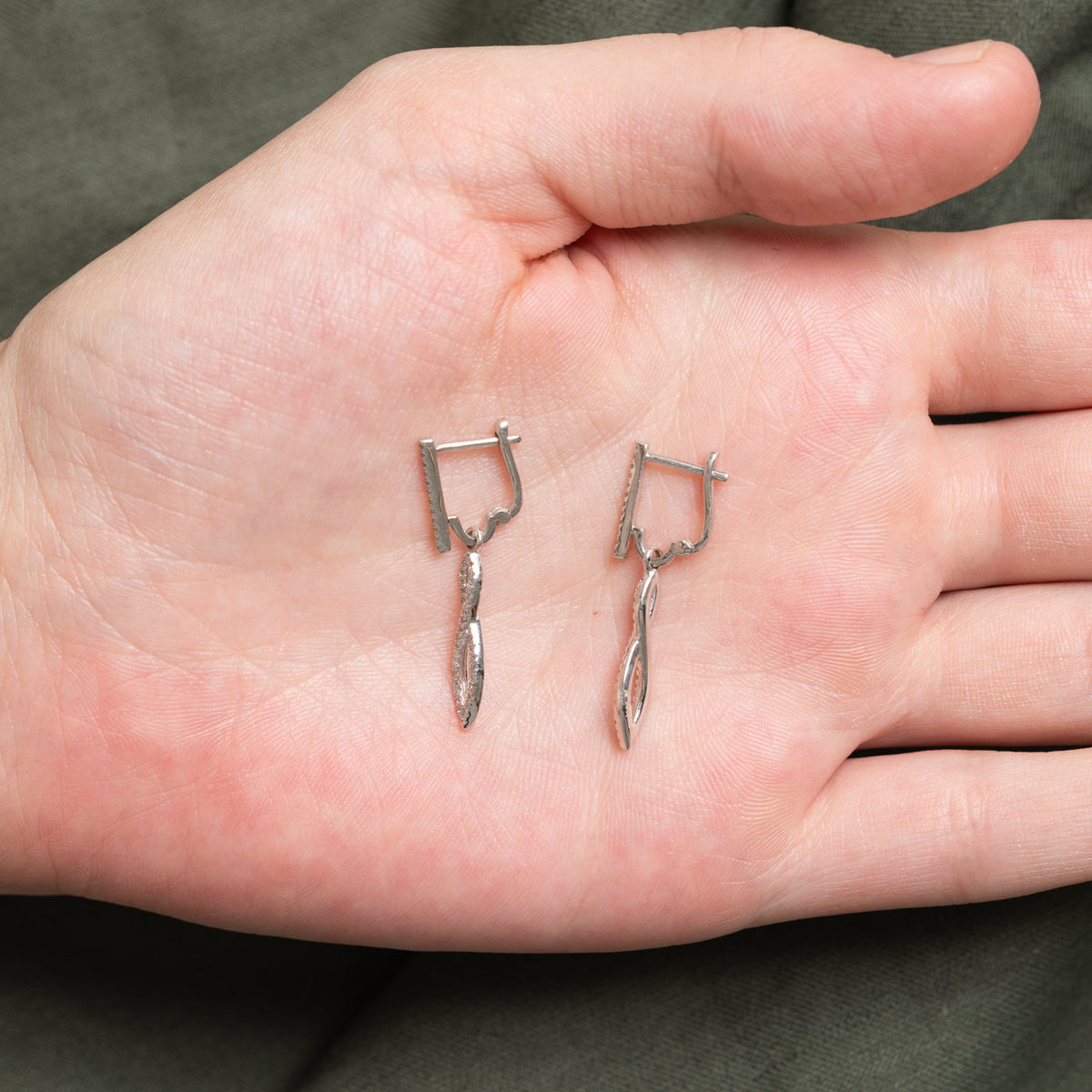 10k Diamond Accented Cross Over Drop Earrings | 0.09ctw