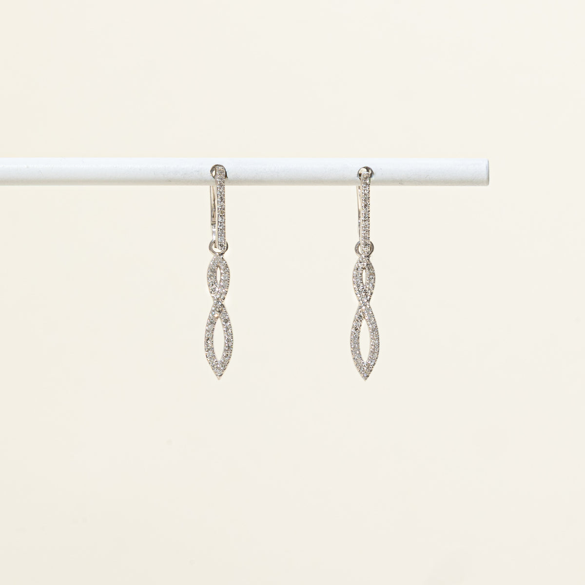 10k Diamond Accented Cross Over Drop Earrings | 0.09ctw