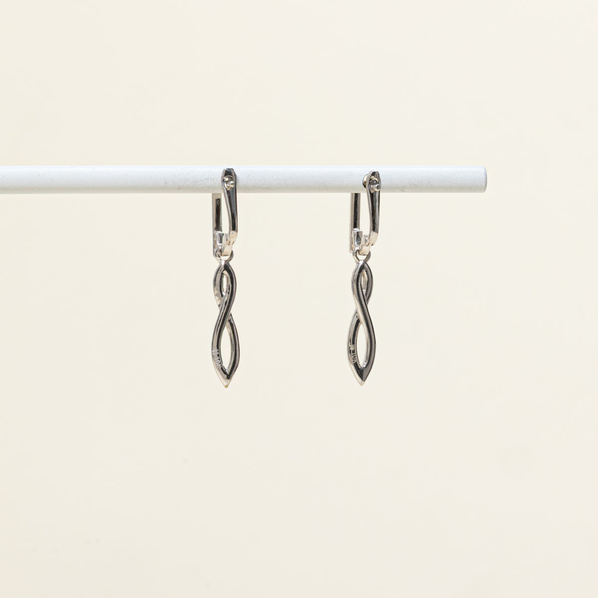 10k Diamond Accented Cross Over Drop Earrings | 0.09ctw