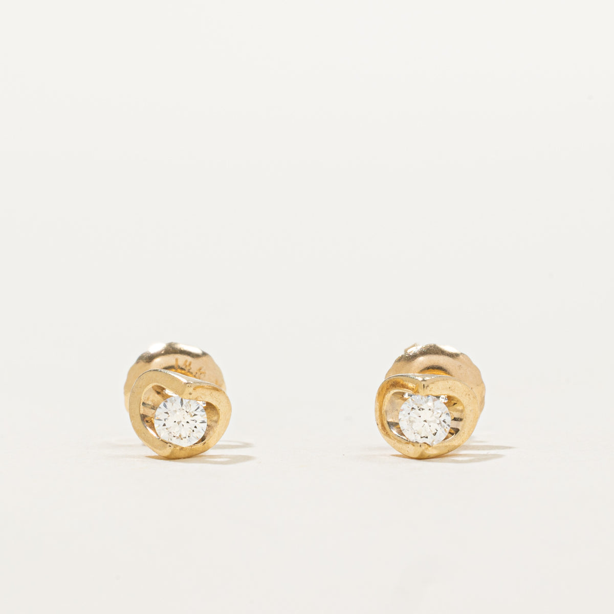 14k Tension Set Diamond Stud Earrings | 0.14ctw