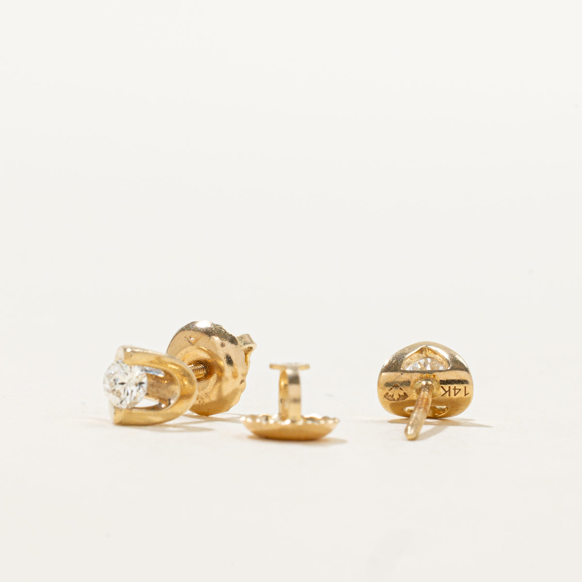 14k Tension Set Diamond Stud Earrings | 0.14ctw