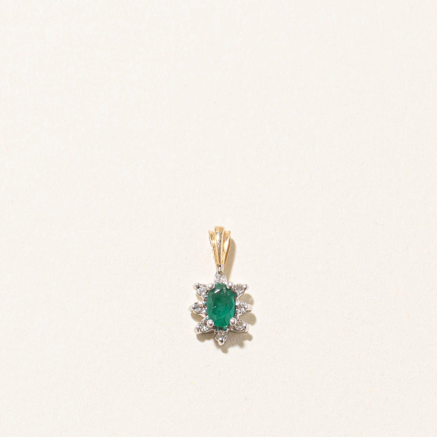 10k Oval Cut Emerald & Diamond Petal Halo Pendant | 0.18ct, 0.07ctw