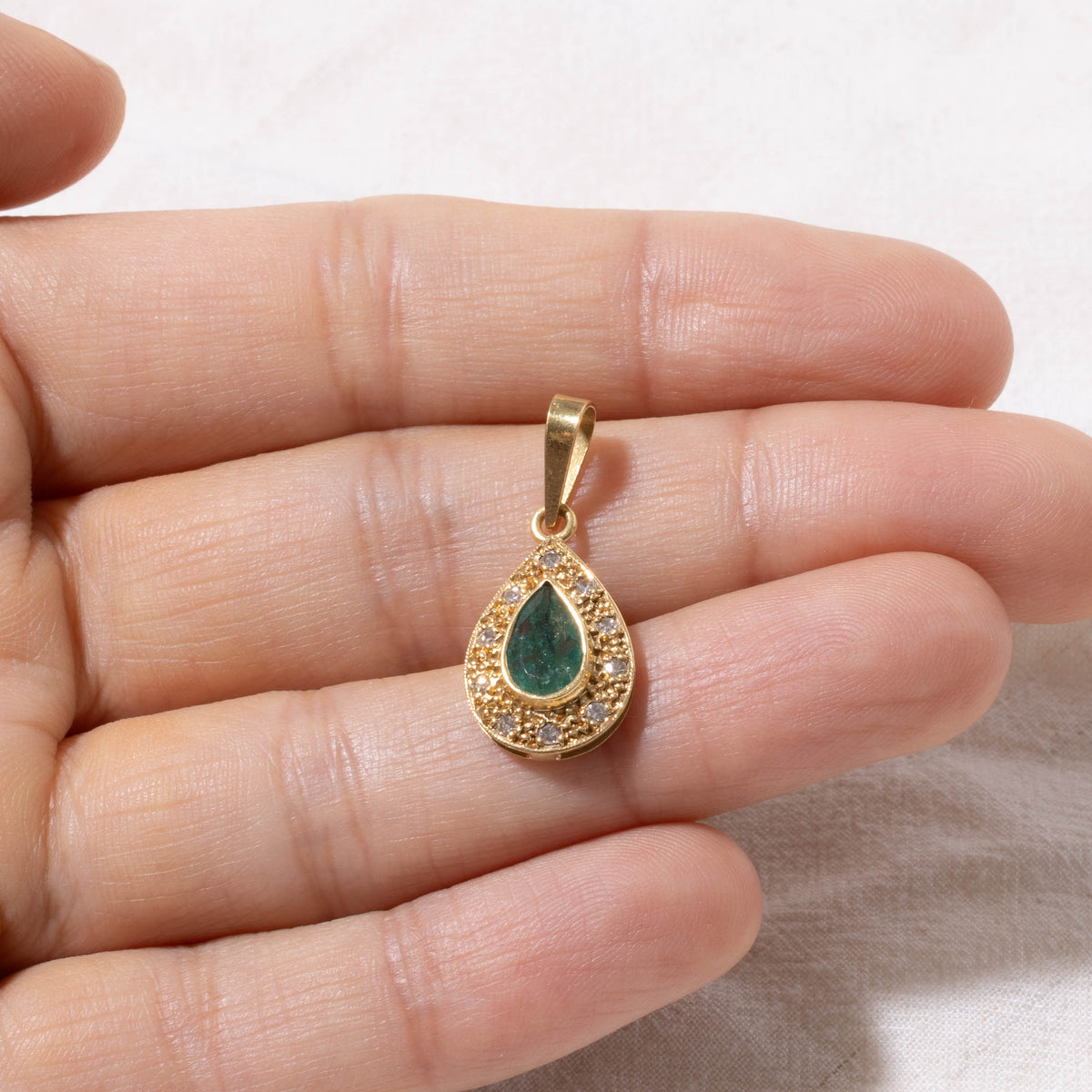 18k Pear Cut Emerald & Diamond Halo Textured Pendant | 0.90ct, 0.12ctw