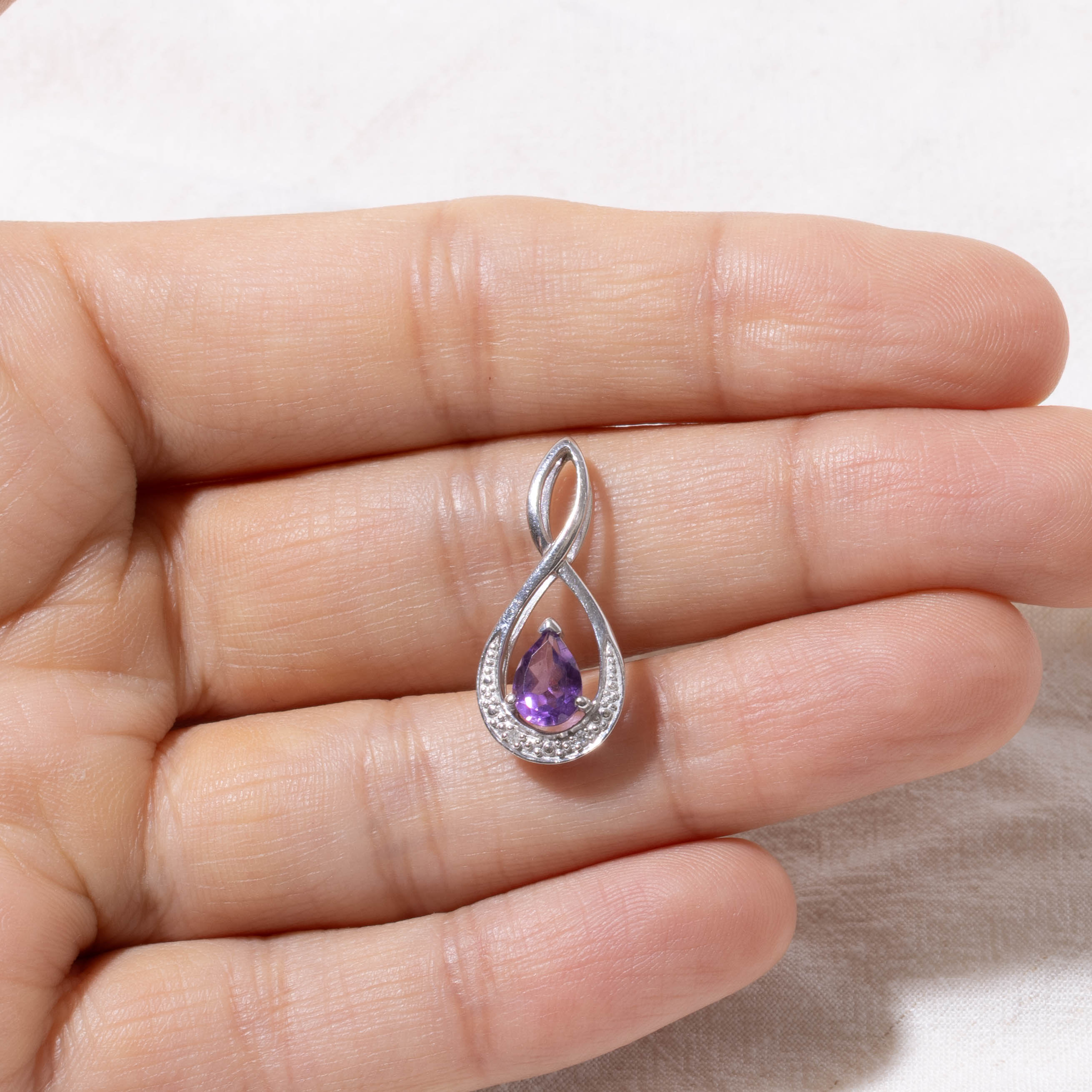 10k Pear Cut Amethyst & Diamond Crossover Pendant | 0.50ct, 0.01ct
