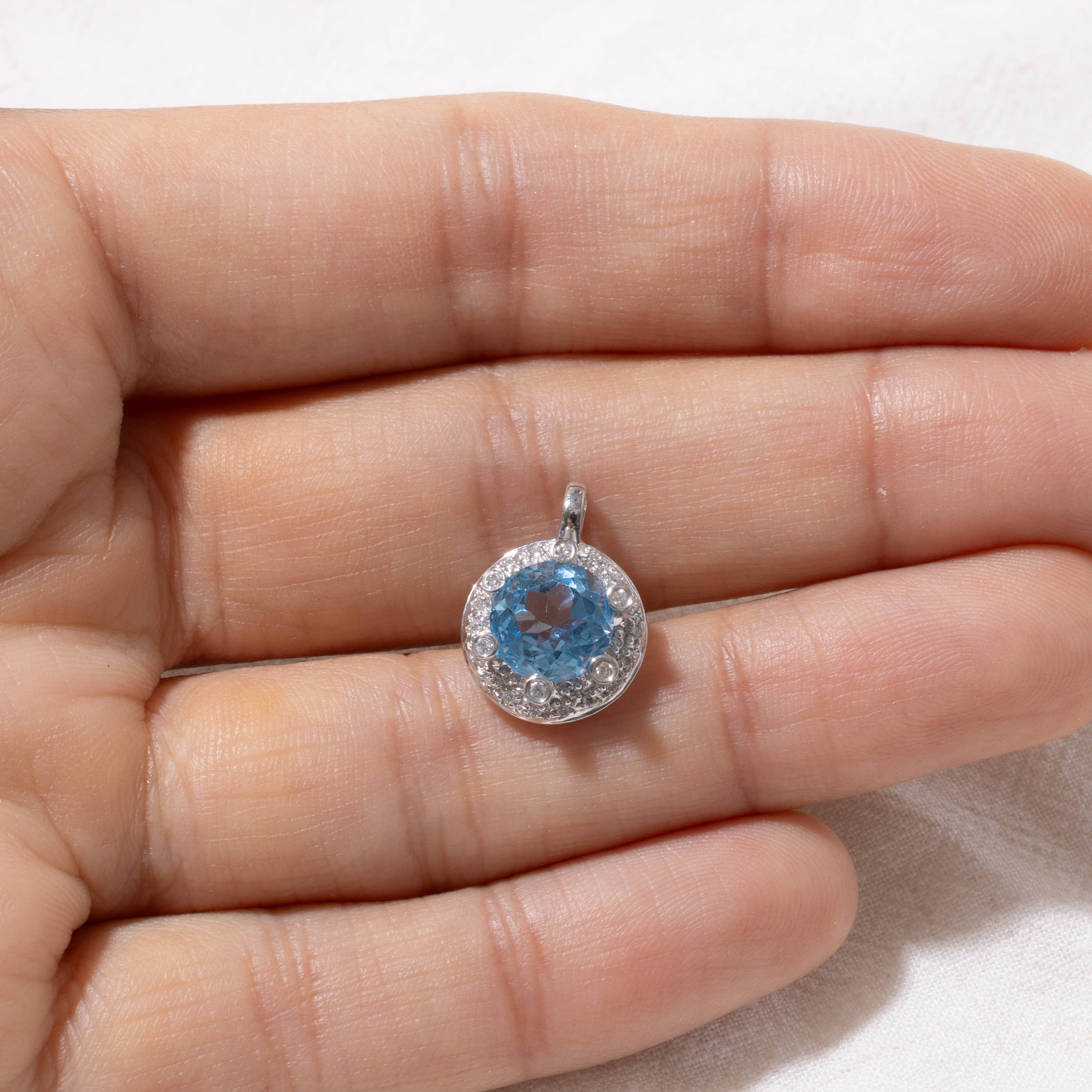 18k White Gold Blue Topaz & Diamond Halo Pendant | 2.50ct, 0.18ctw