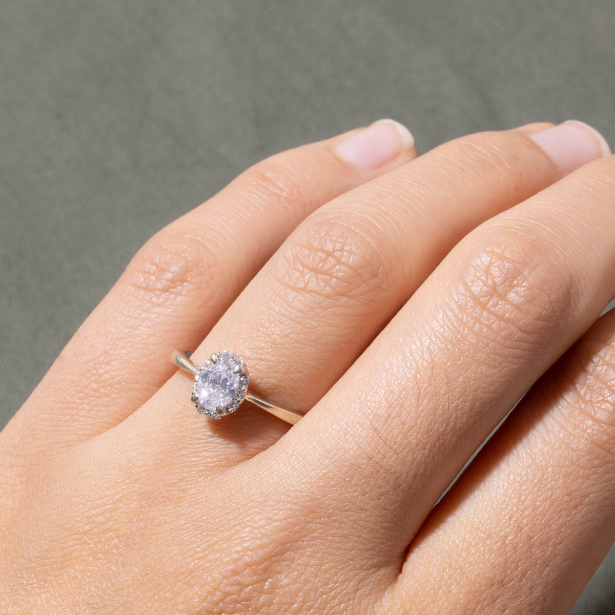 14k Oval Cut Diamond Halo Ring | 0.55ct I1 F, 0.1ctw | SZ 7