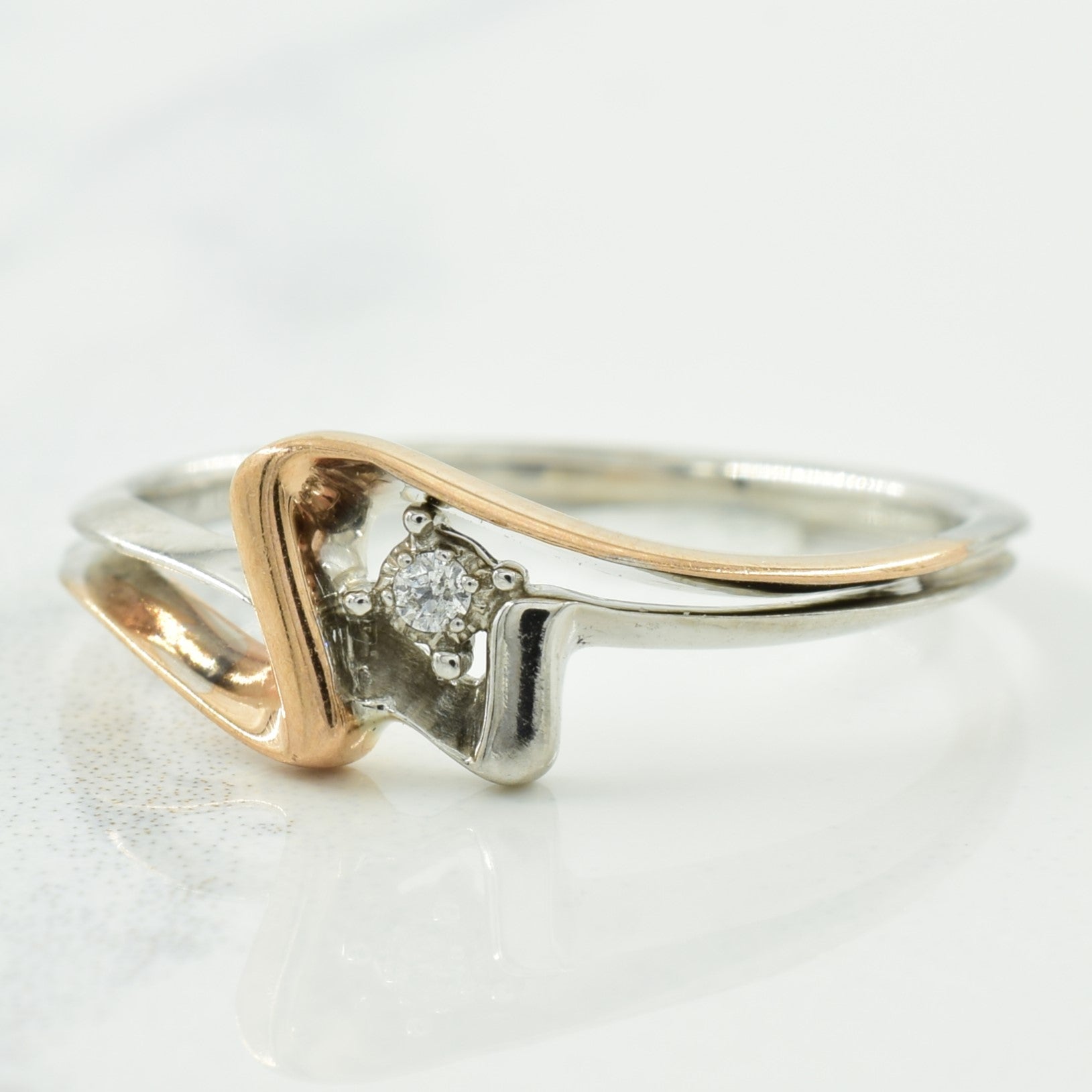 Bague en or bicolore et diamant | 0,02 ct | Taille 7 | 