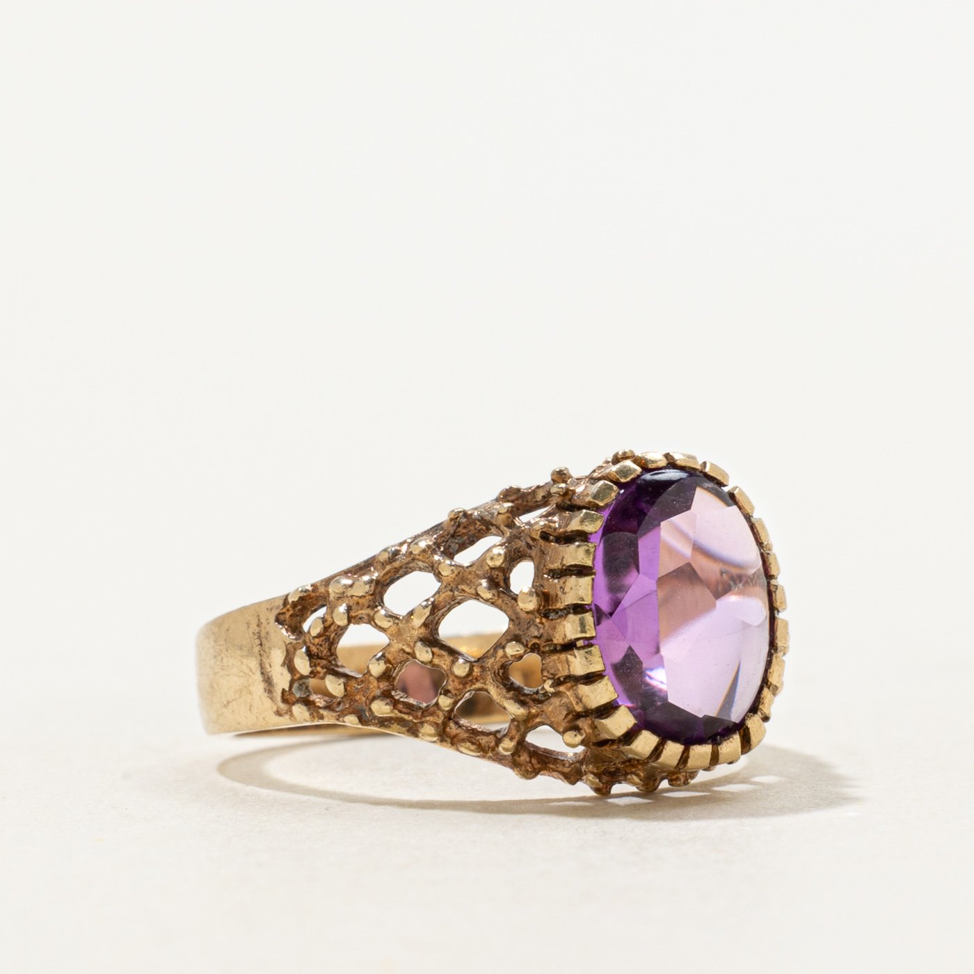 10K Ring with Oval Buff Cut Synthetic Sapphire