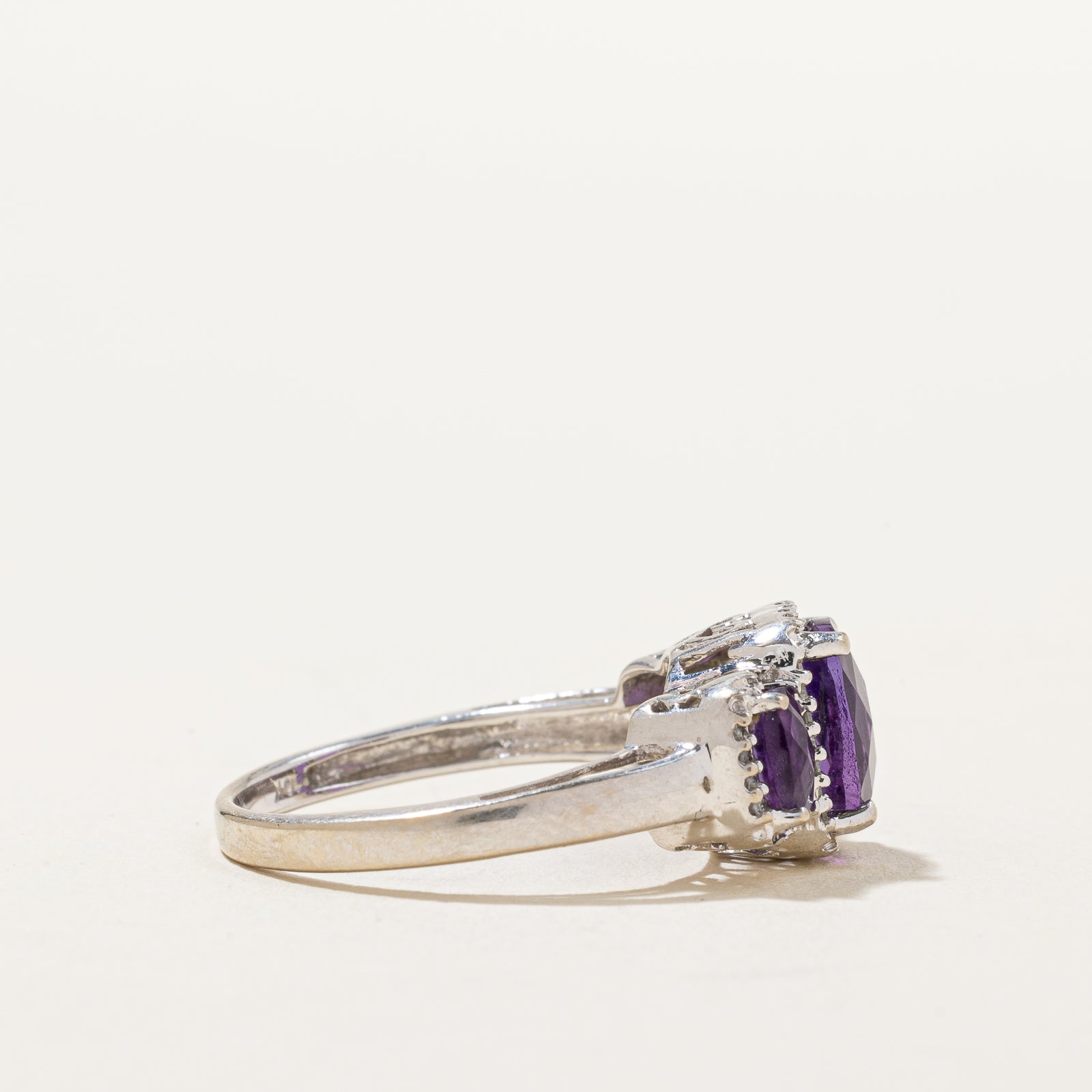 Three Stone Amethyst & Diamond Halo Ring | 1.70ctw, 0.08ctw | SZ 7 |