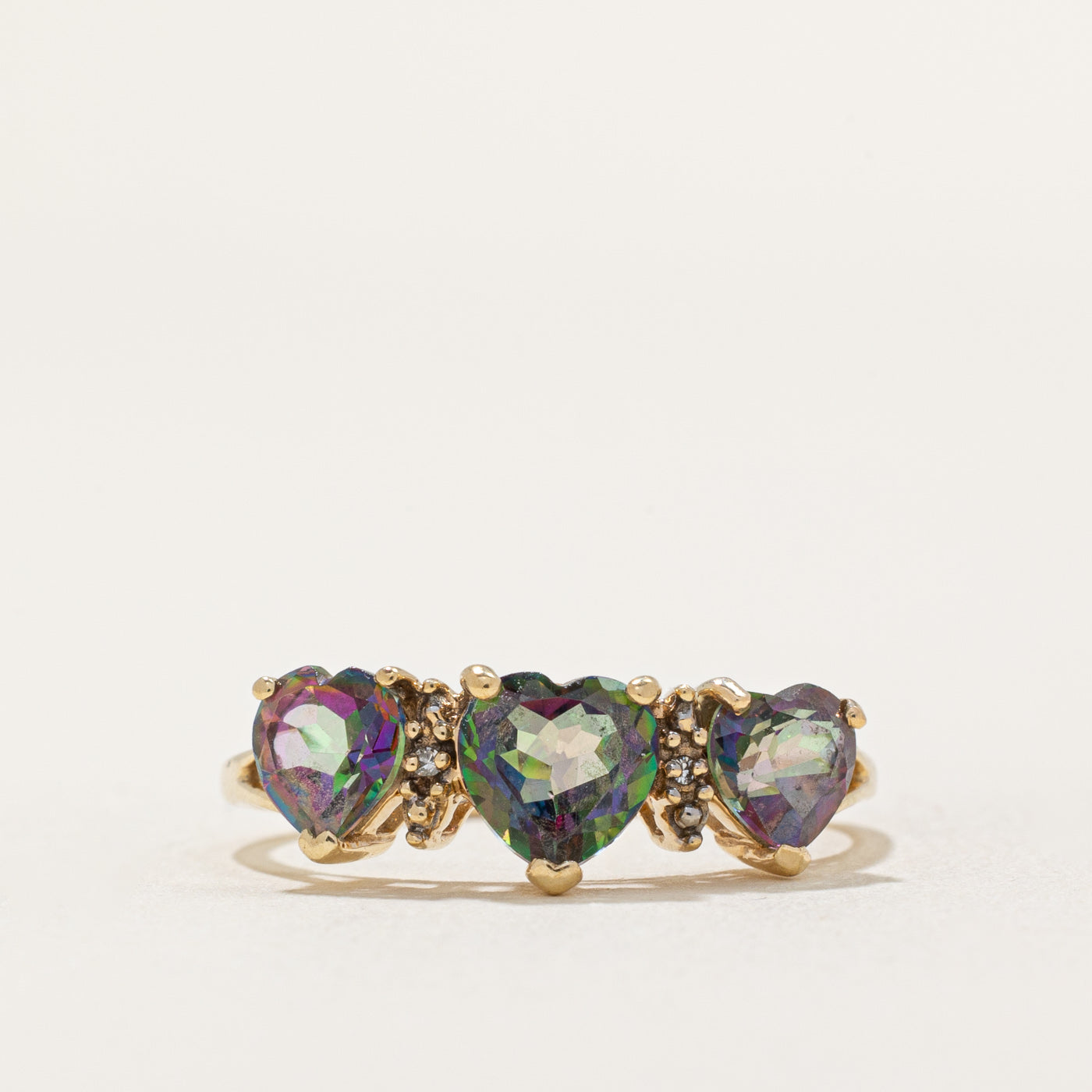 Three Stone Heart Cut Mystic Topaz & Diamond Ring | 1.50ctw, 0.005ctw | SZ 7 |