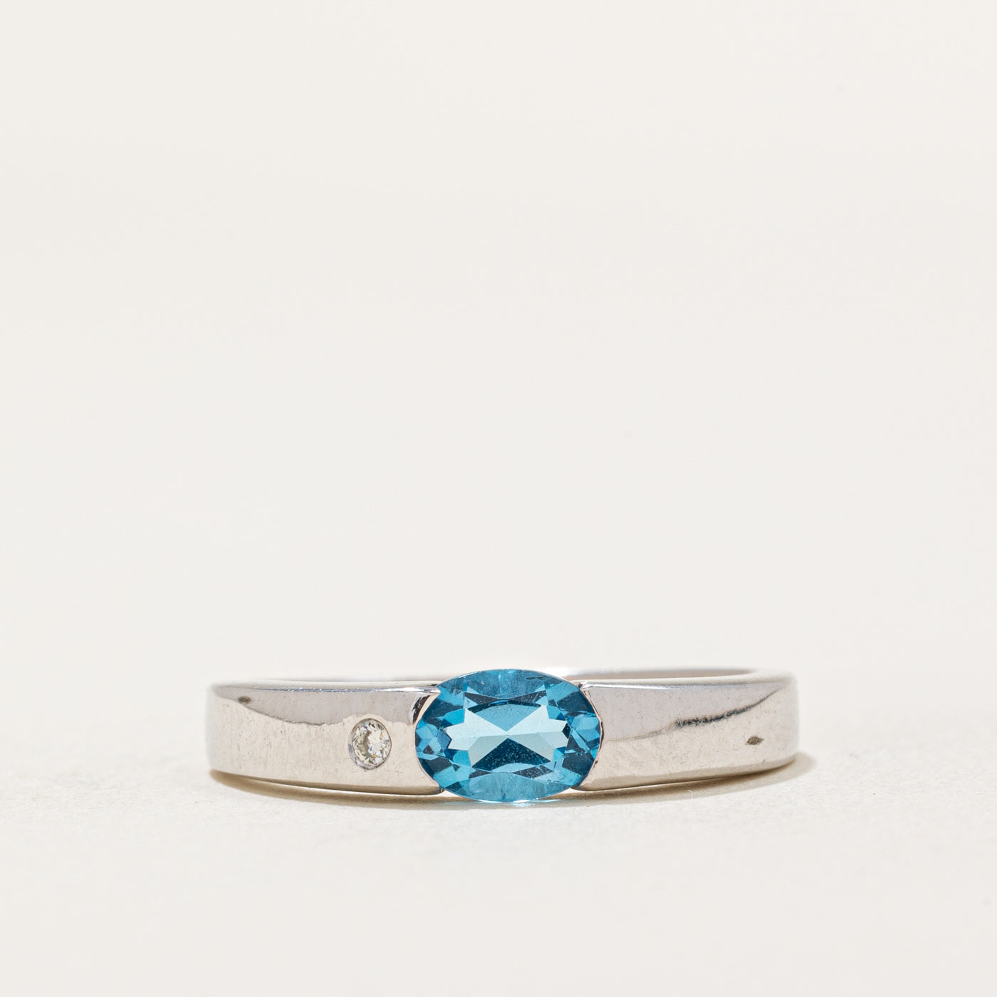 Oval Cut East West Topaz & Diamond Ring | 0.40ct, 0.01ct | SZ 5.25 |