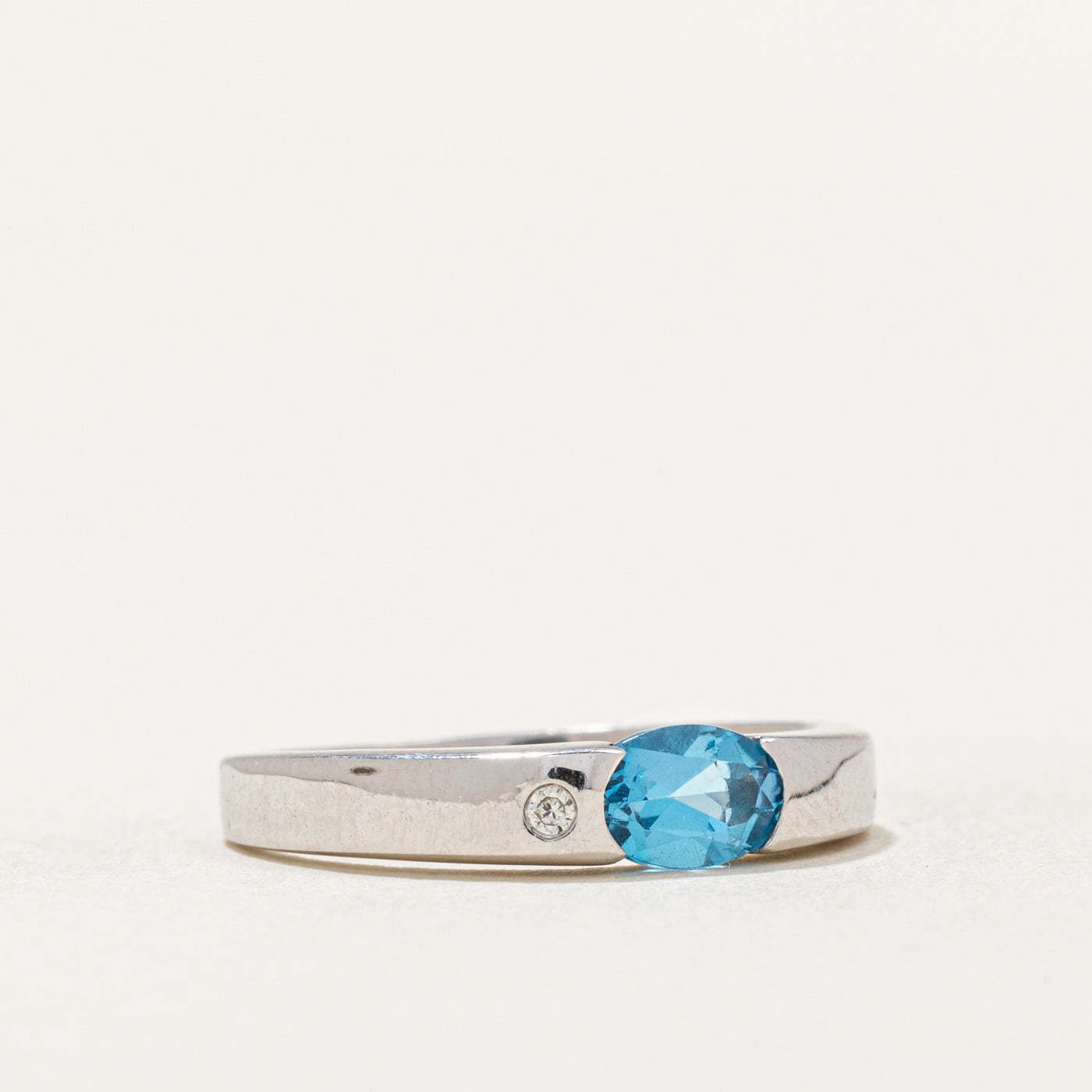 Oval Cut East West Topaz & Diamond Ring | 0.40ct, 0.01ct | SZ 5.25 |