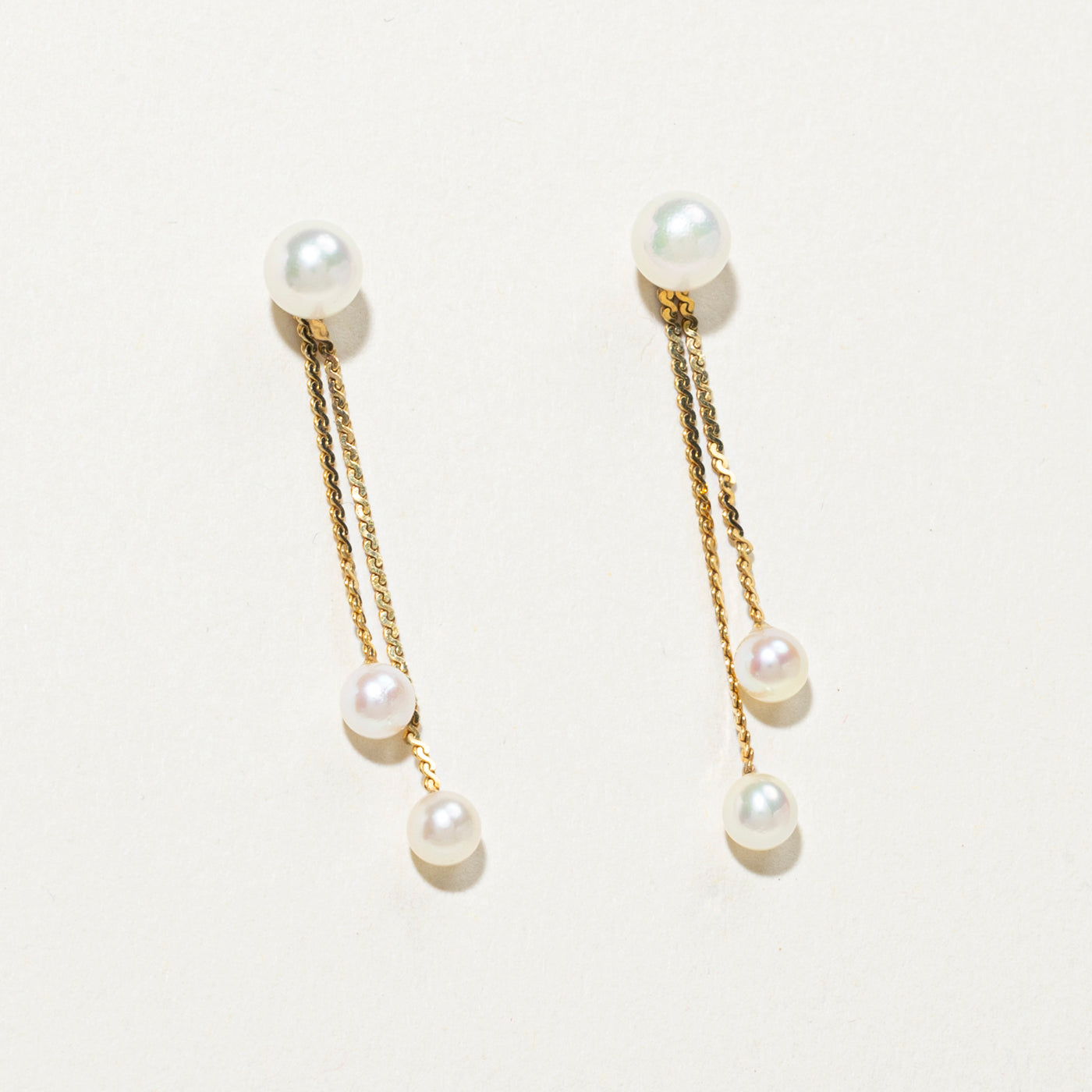 Boucles d'oreilles pendantes en perles 10 carats