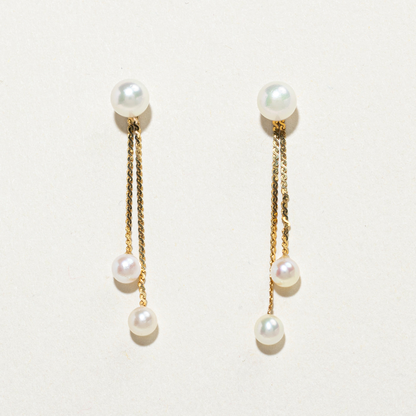 Boucles d'oreilles pendantes en perles 10 carats