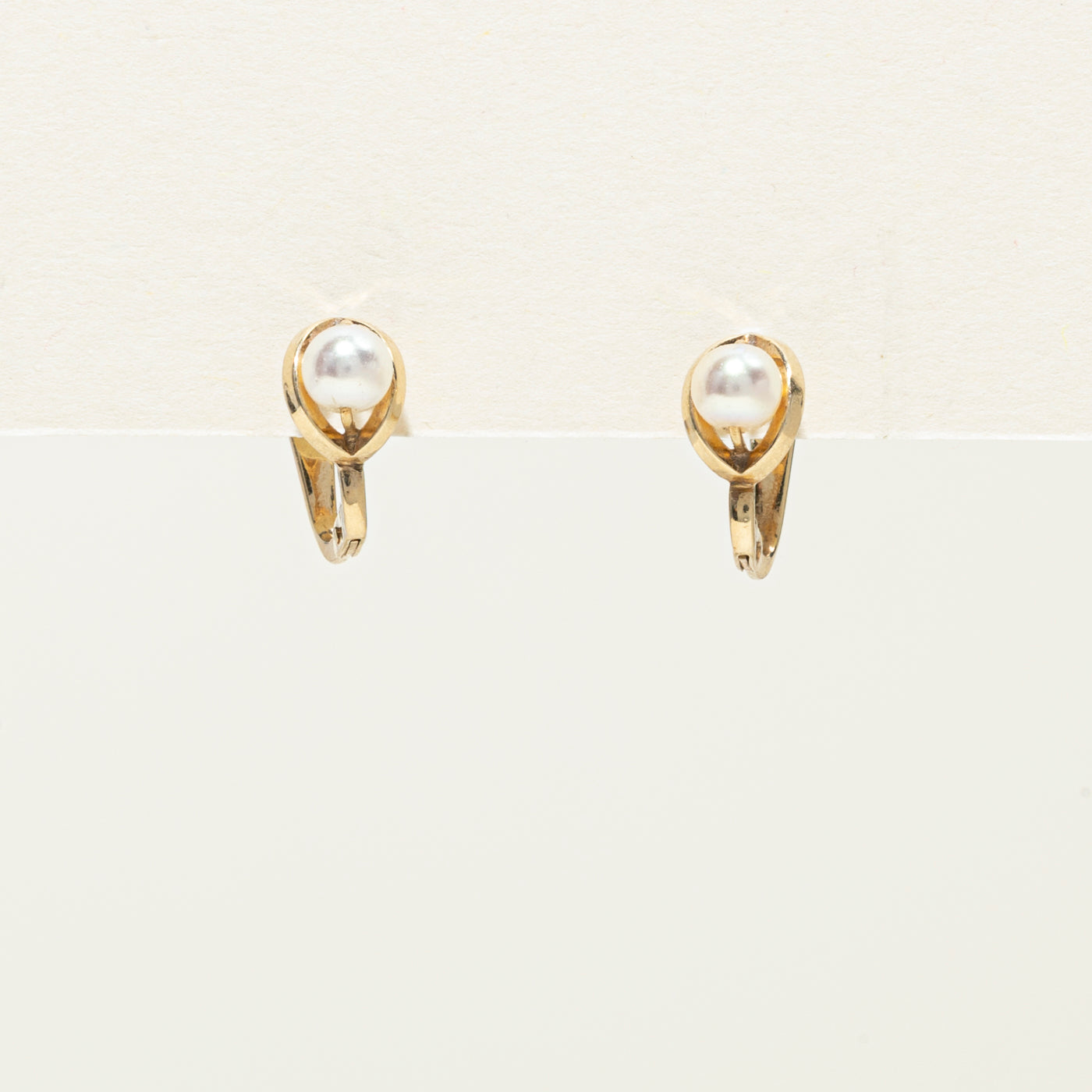 10K Pearl Huggie Earrings