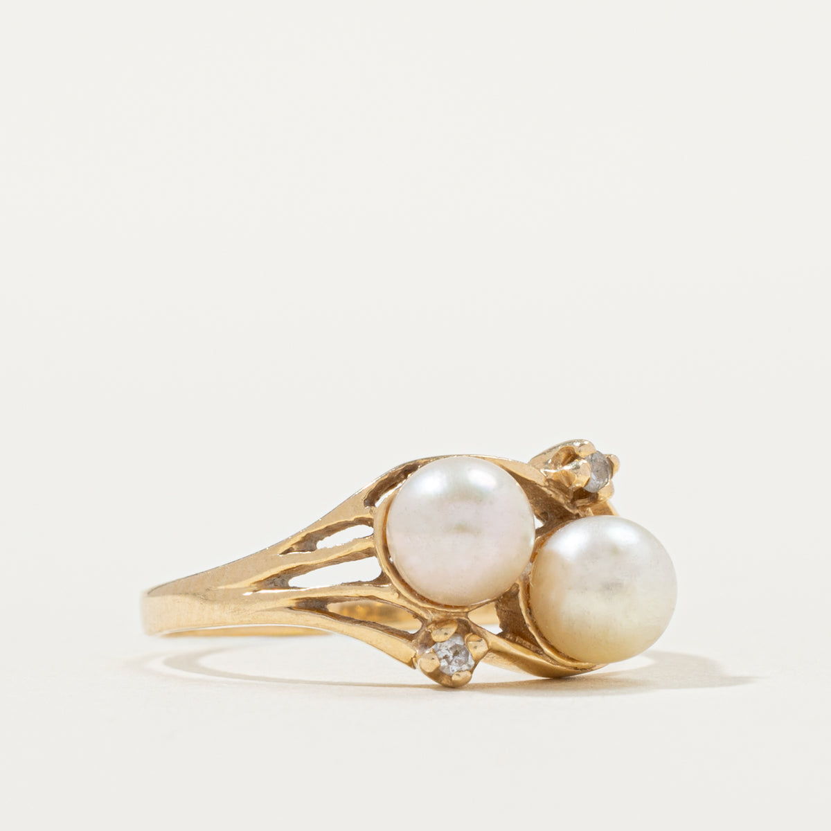 14k Toi et Moi Pearl & Diamond Accented Openwork Bypass Ring | 0.02ctw | SZ 7.25