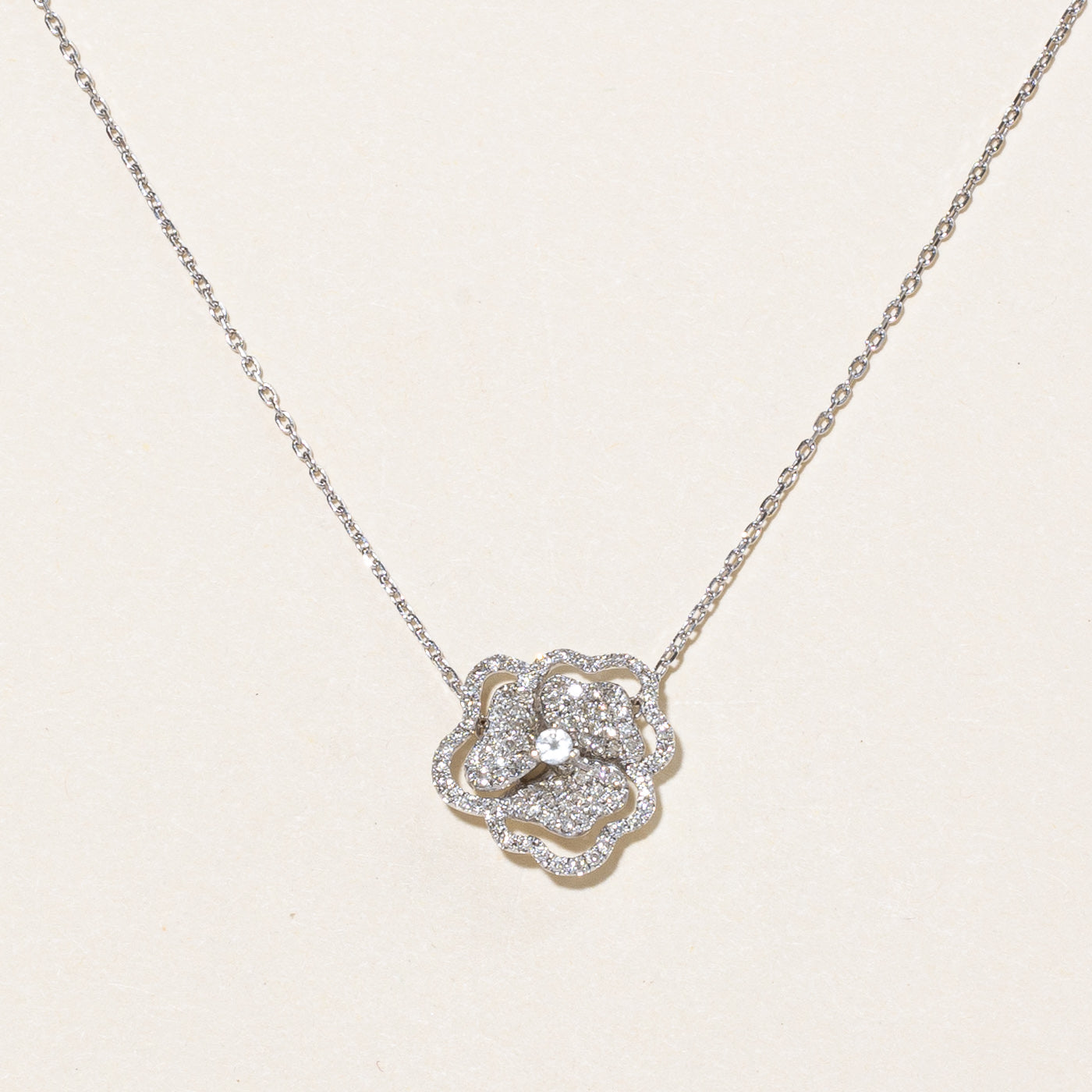 Diamond & Topaz Flower Pendant Necklace | 0.32ctw, 0.05ctw | 16" |