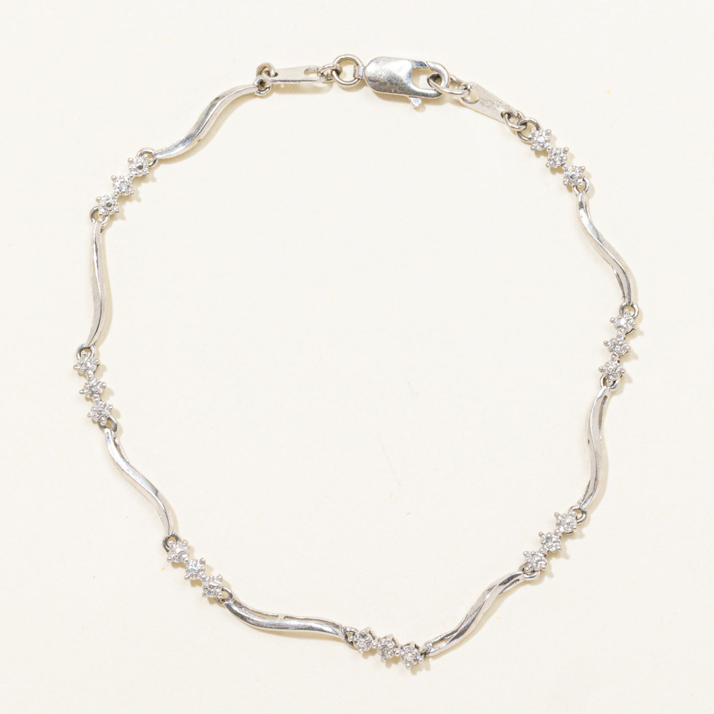10k Scattered Diamond Wave Bracelet | 7.25"