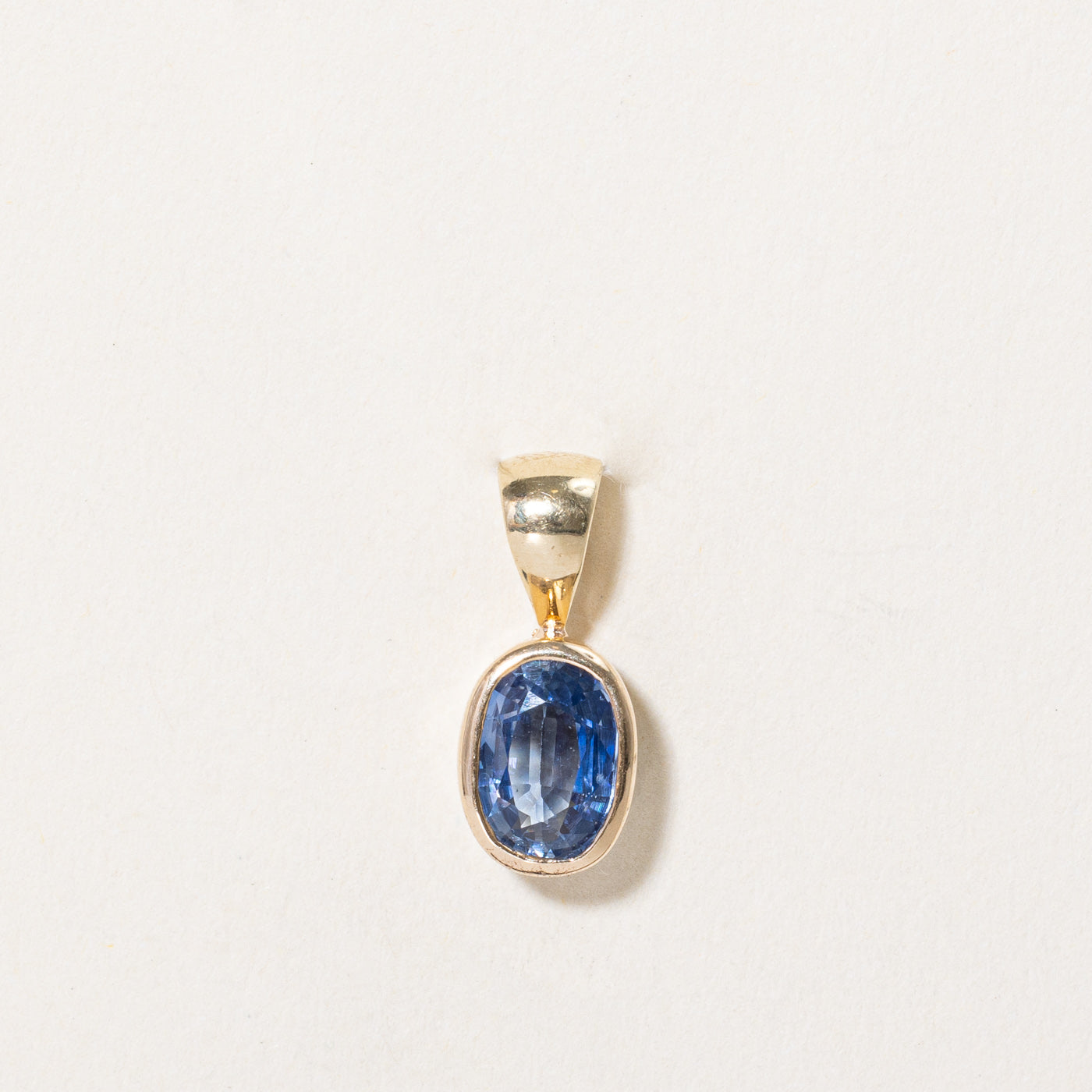 Bezel Set Oval Cut Sapphire Pendant | 1.25ct |