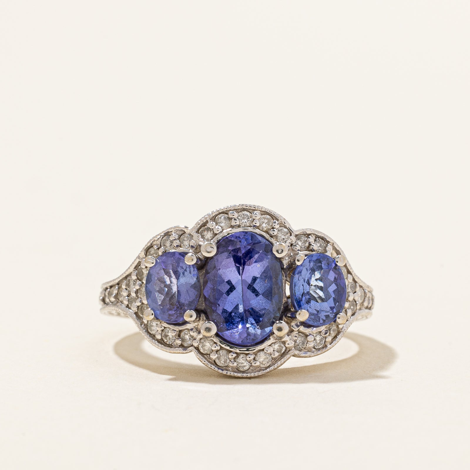 Three Stone Tanzanite & Diamond Ring | 1.50ctw, 0.19ctw | SZ 6 |