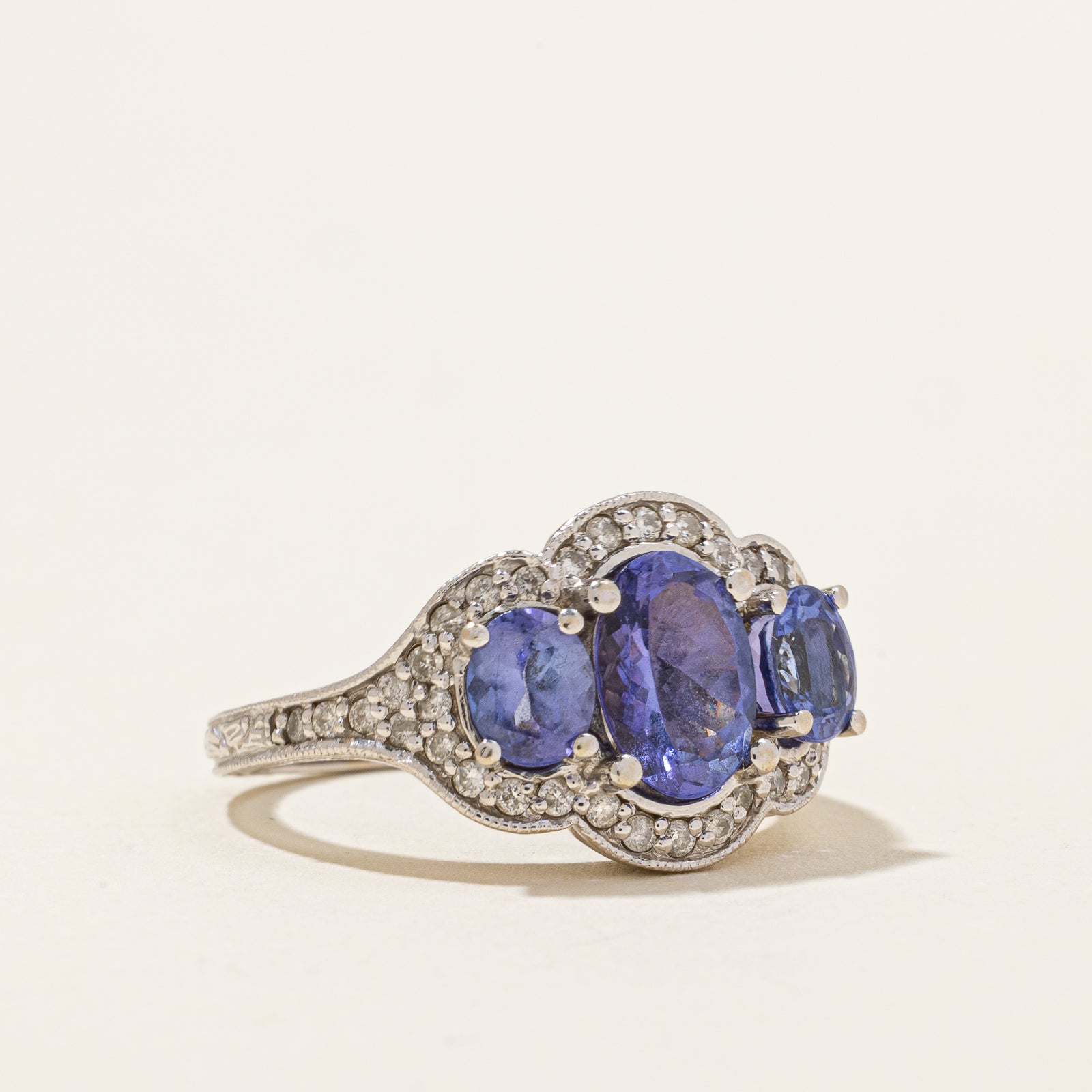 Three Stone Tanzanite & Diamond Ring | 1.50ctw, 0.19ctw | SZ 6 |