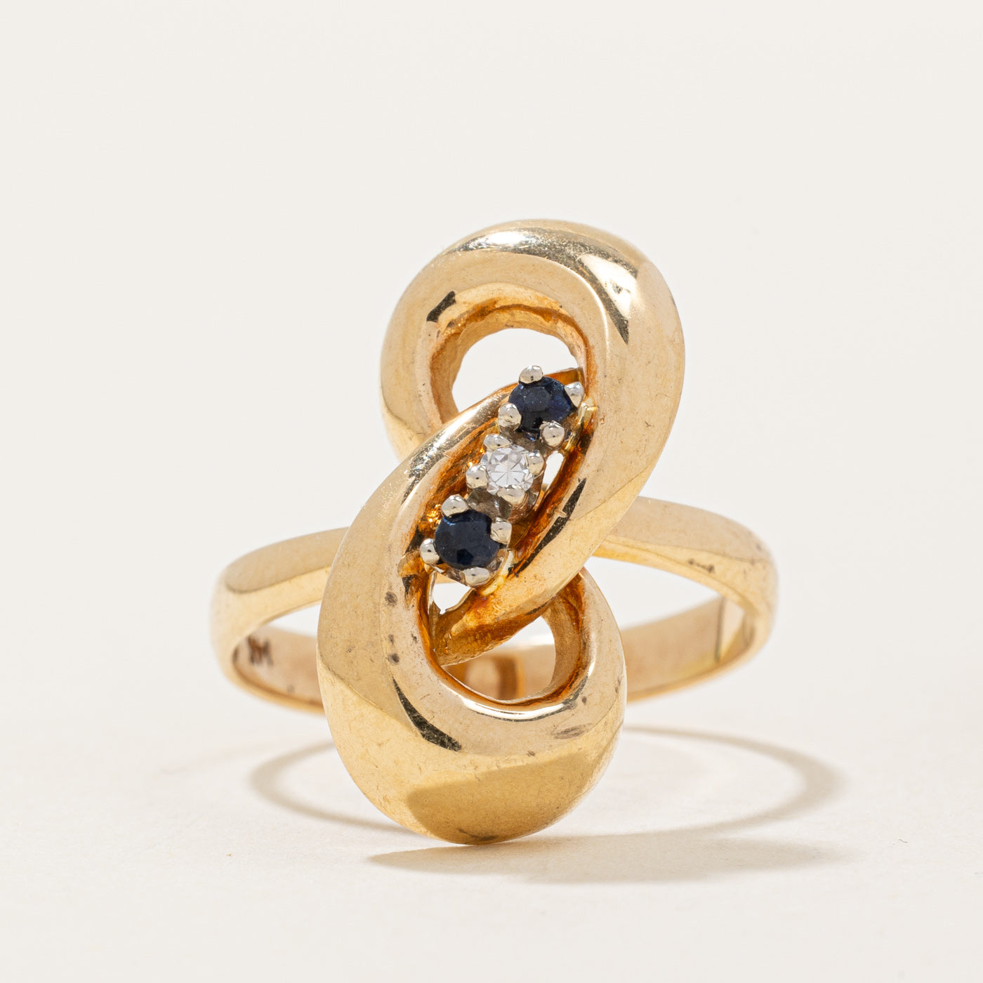 Sapphire & Diamond Knot Ring | 0.044ctw, 0.015ct | SZ 6.25 |