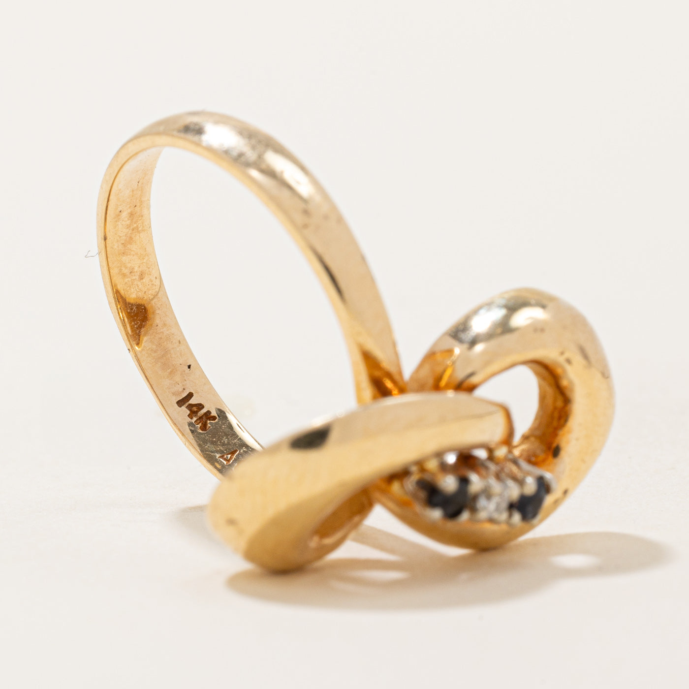 Sapphire & Diamond Knot Ring | 0.044ctw, 0.015ct | SZ 6.25 |